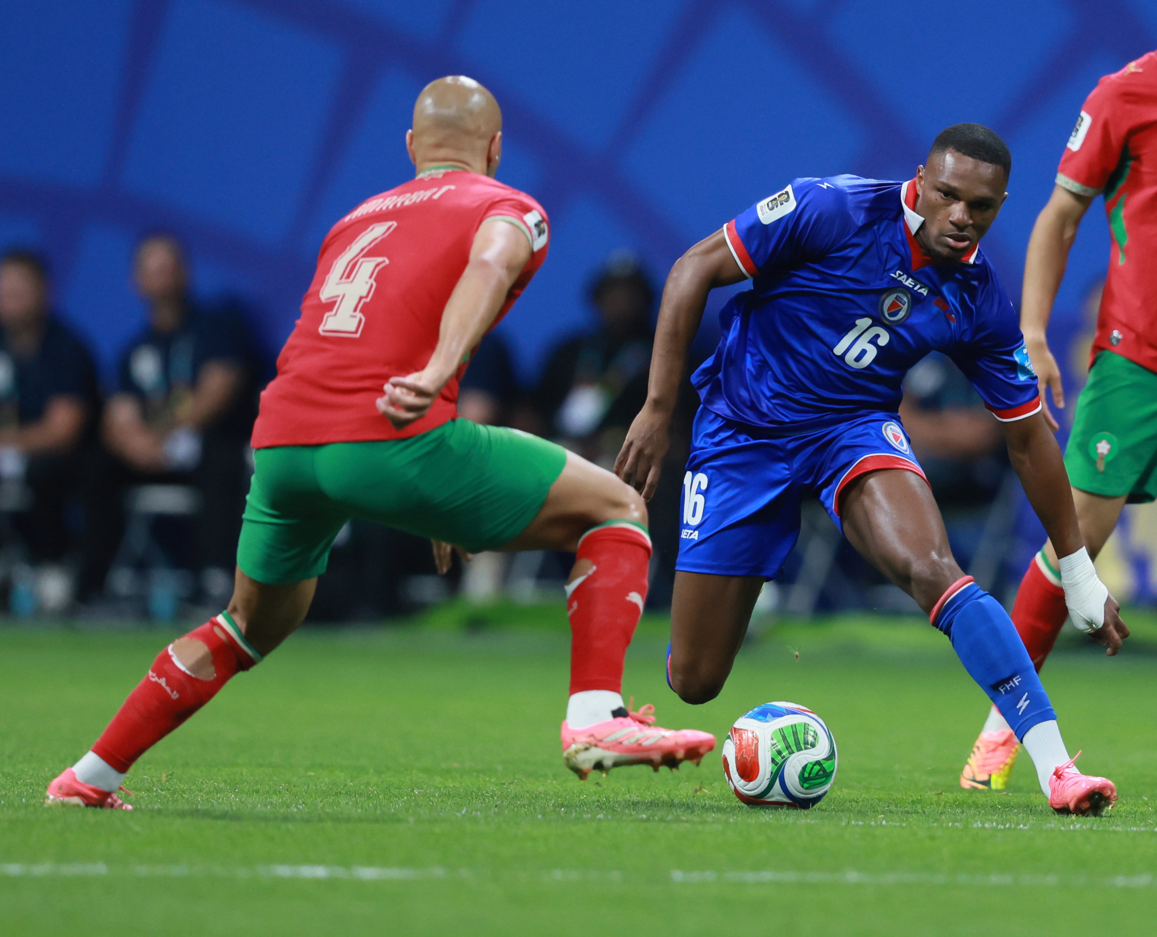 Haiti's Lenny Joseph, right makes move against Morocco's Sofyan Amrabat during first half of Morocco vs. Haiti Group C FIFA World Cup match at Atlanta Stadium (Mercedes-Benz Stadium) on Wednesday, June 24, 2026. (Jason Getz/AJC)