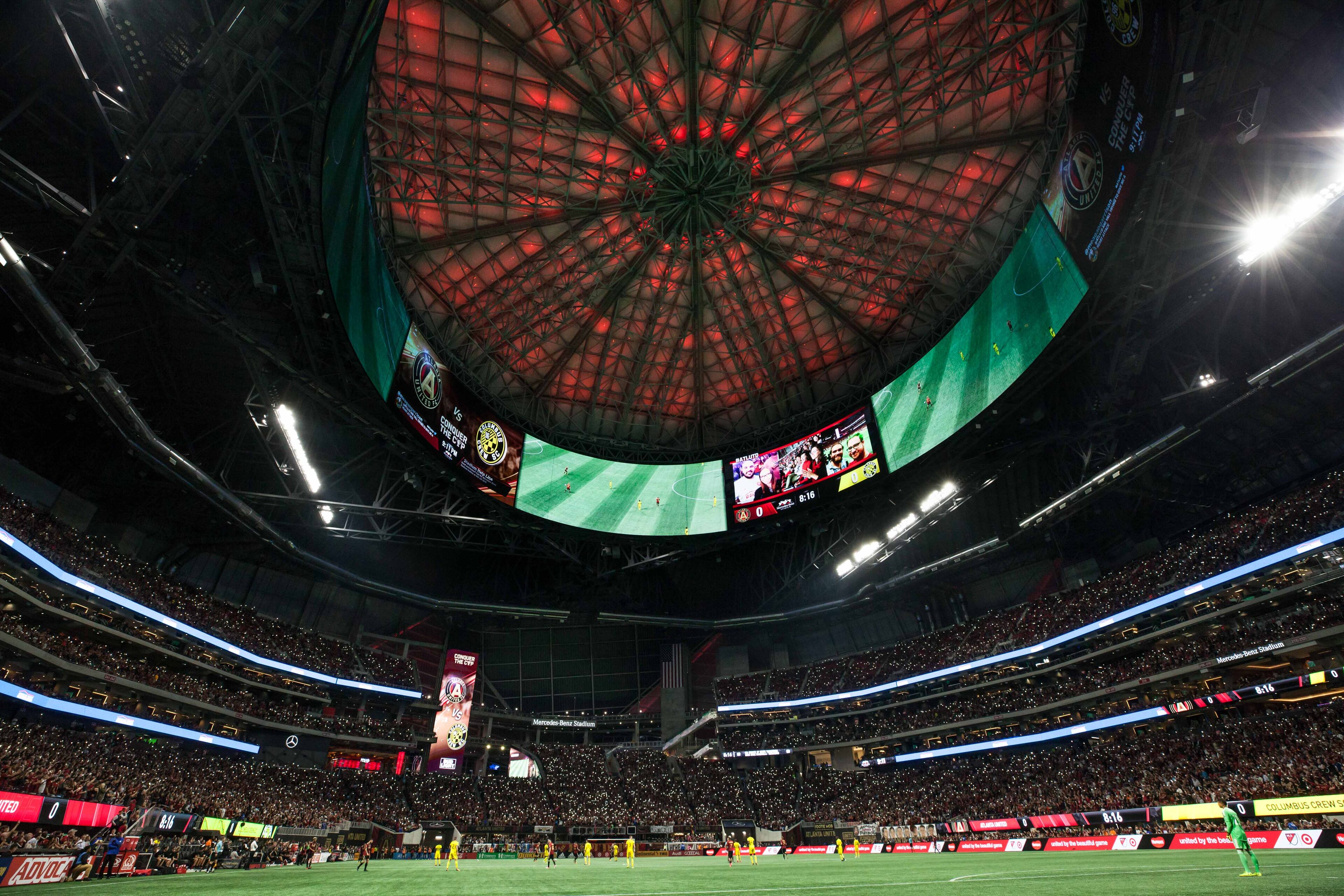 Fans hold up their cellphones during a MLS playoff game between Atlanta United and Columbus Crew at Mercedes-Benz Stadium, Thursday, Oct. 26, 2017, in Atlanta. Columbus defeated Atlanta 1-0. BRANDEN CAMP/SPECIAL