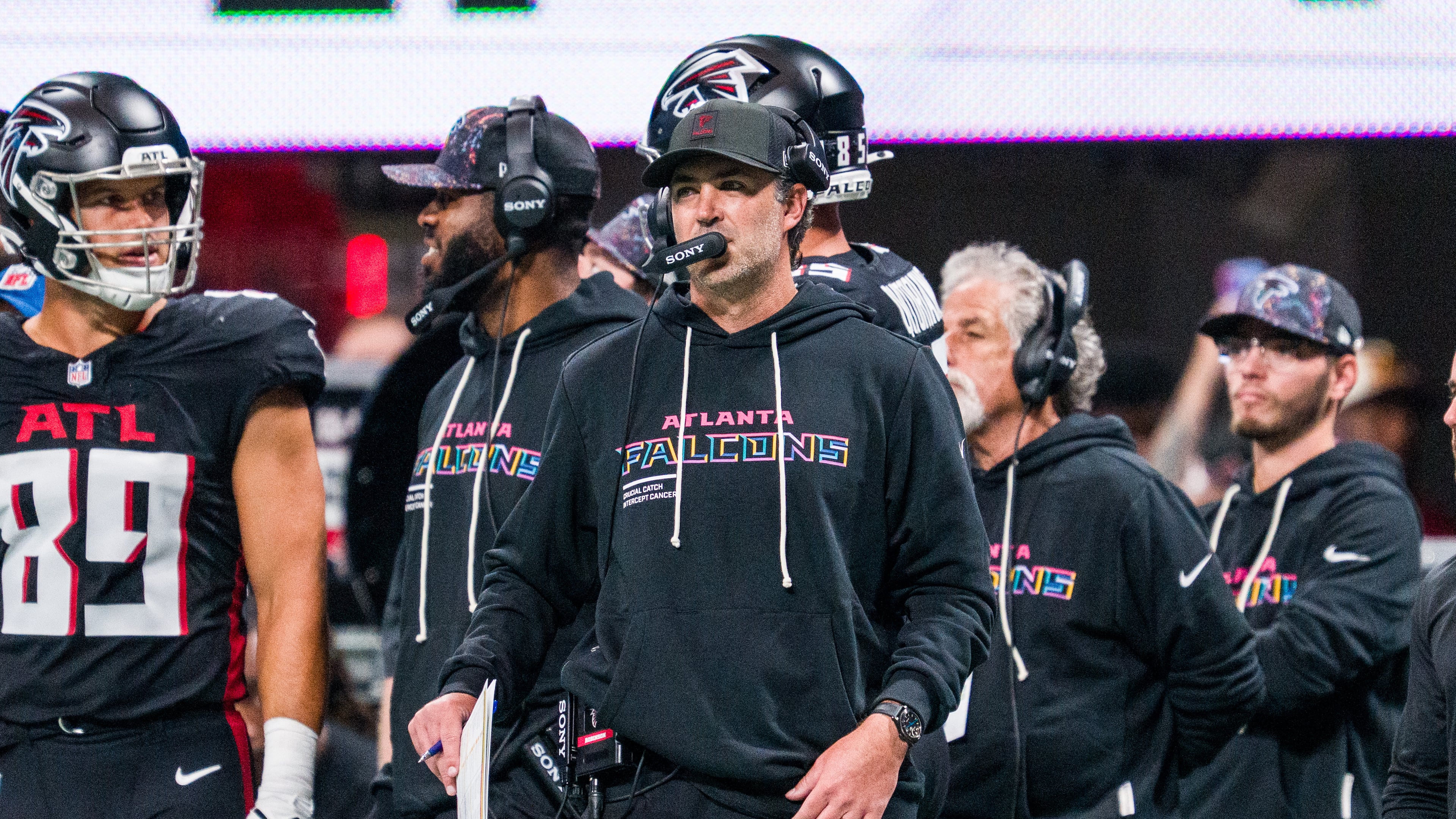 FILE - Atlanta Falcons offensive coordinator Zac Robinson works during the first half of an NFL football game against the Washington Commanders, Sunday, Sep. 28, 2025, in Atlanta. (AP Photo/Danny Karnik, File)