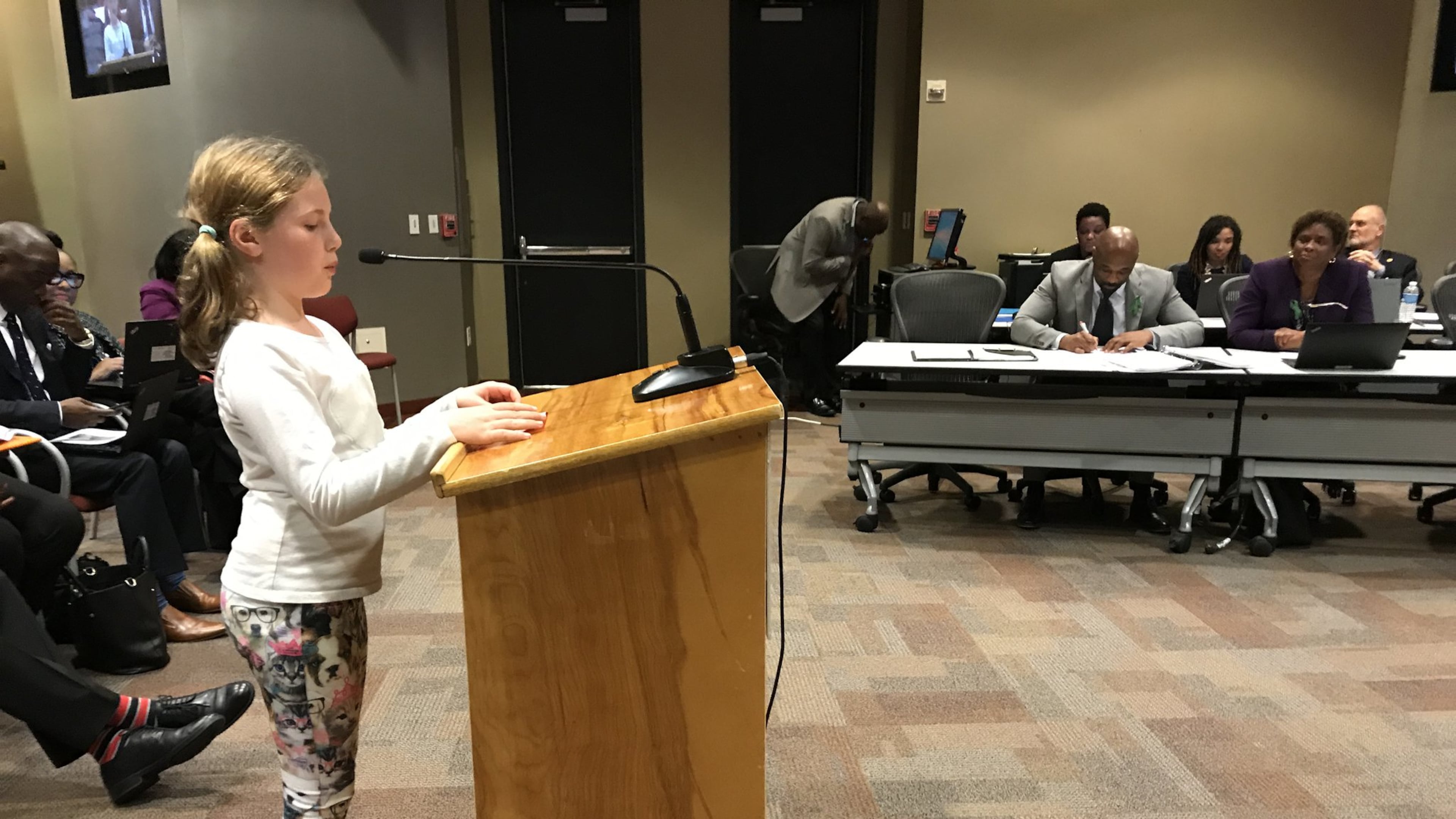 Falyn Handley, 10, a fifth-grader at Springdale Park Elementary School, wears dog-print leggings Monday while asking the Atlanta Board of Education to update the district’s student dress code policy. She collected more than 1,000 signatures on an online petition.