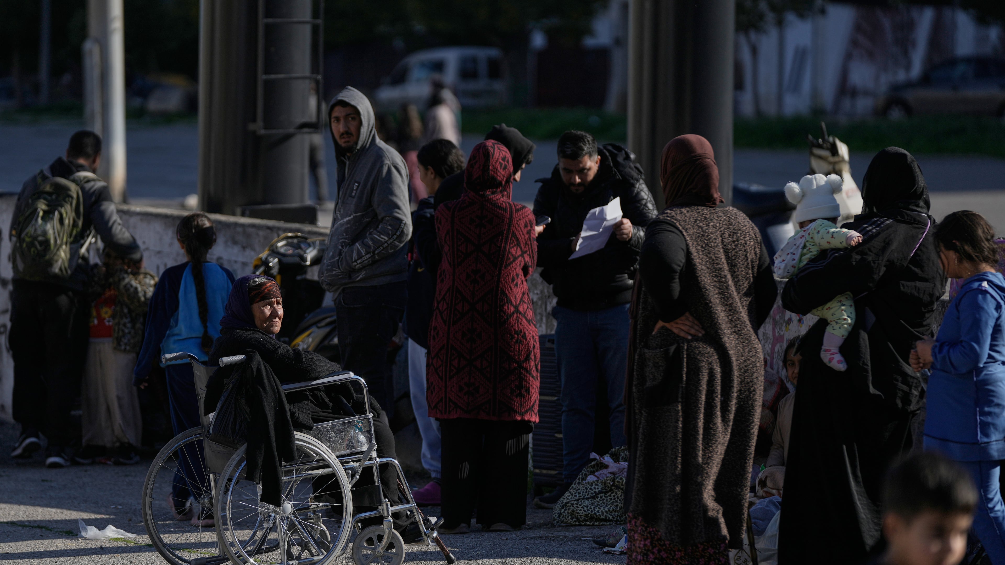 Displaced families gather in Martyrs' Square after fleeing Israeli airstrikes in Dahiyeh, a southern suburb of Beirut, Lebanon, Monday, March 2, 2026. (AP Photo/Bilal Hussein)