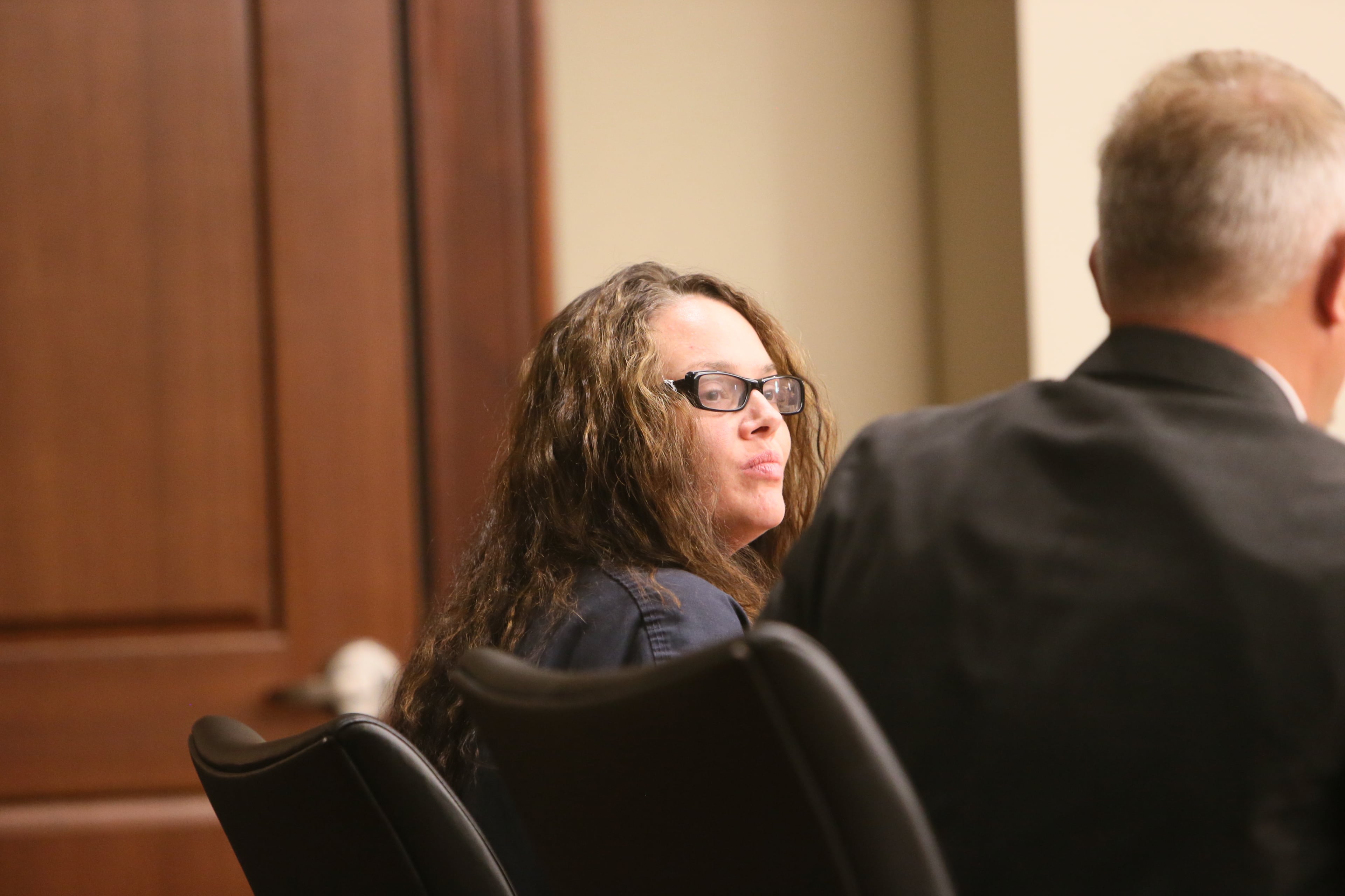 In a navy jail suit, Anna Benson, 37, sat quietly Thursday afternoon in Cobb County Superior Court as her attorney asked Judge LaTain Kell to grant $50,000 bond, along with numerous stipulations, including psychological evaluation and treatment. Benson has been in jail since July 7, when she was arrested after allegedly threatening her husband, armed with several weapons, at his Smyrna home.