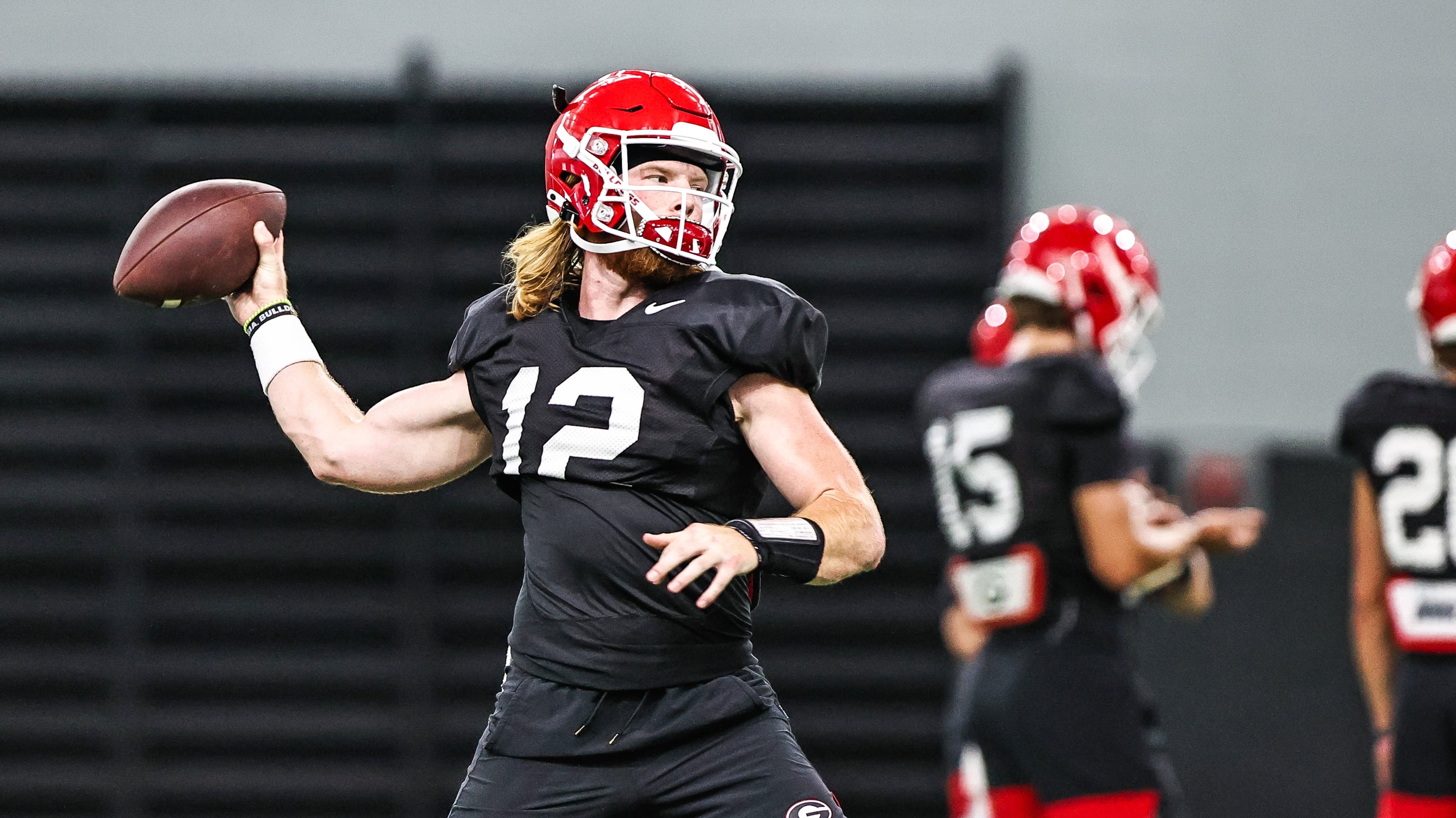 Georgia quarterback Brock Vandagriff (12) attempts a pass during the Bulldogs’ practice Tuesday, Aug. 24, 2021, in Athens. (Tony Walsh/UGA)