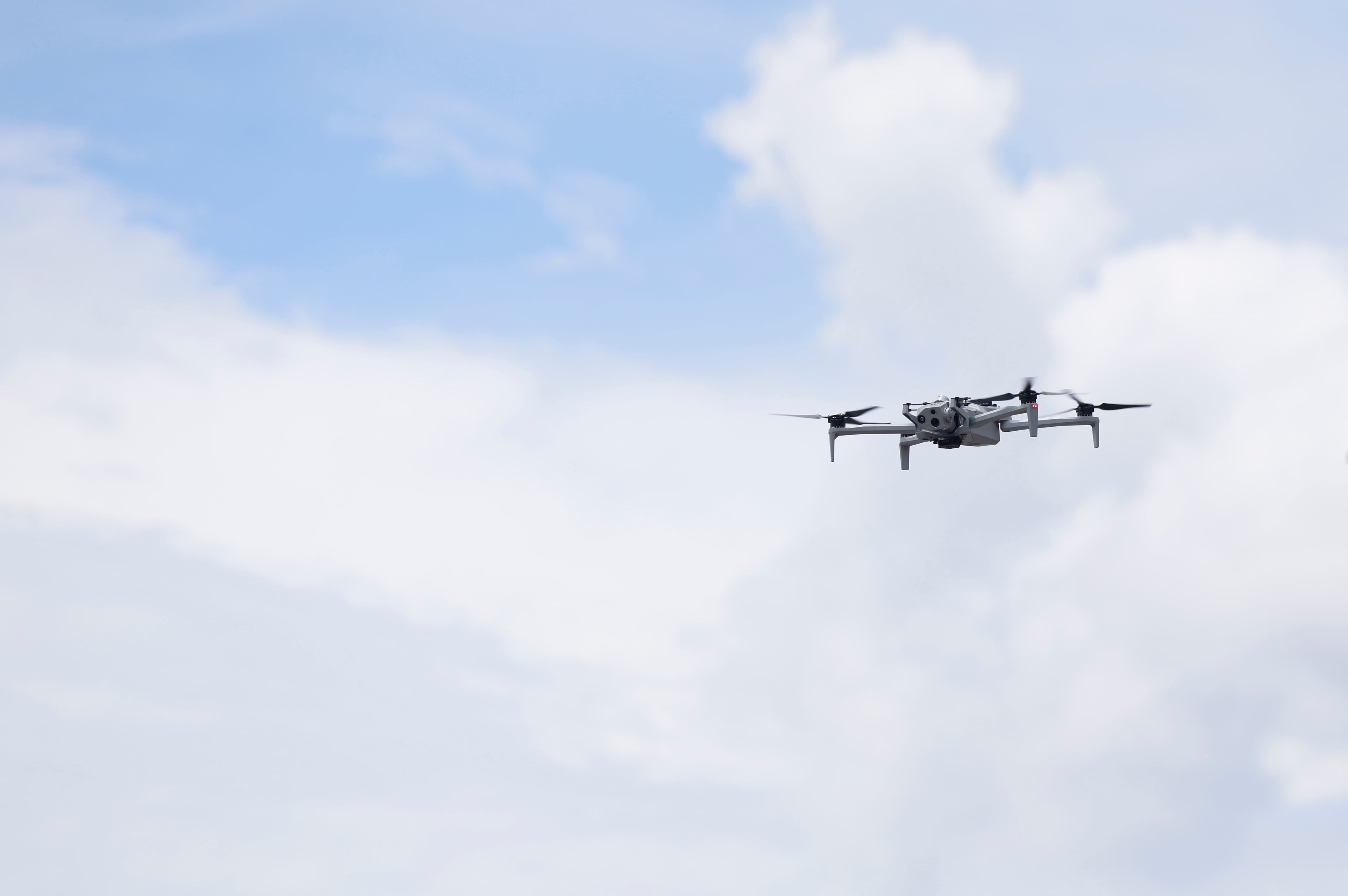 The FBI grounded more than a dozen recreational drones Thursday, the first day of the FIFA Fan Festival at Centennial Olympic Park in Atlanta. Here, FBI officials demonstrate a drone in May after announcing flight restrictions in Atlanta during the World Cup. (Akili-Casundria Ramsess for the AJC)