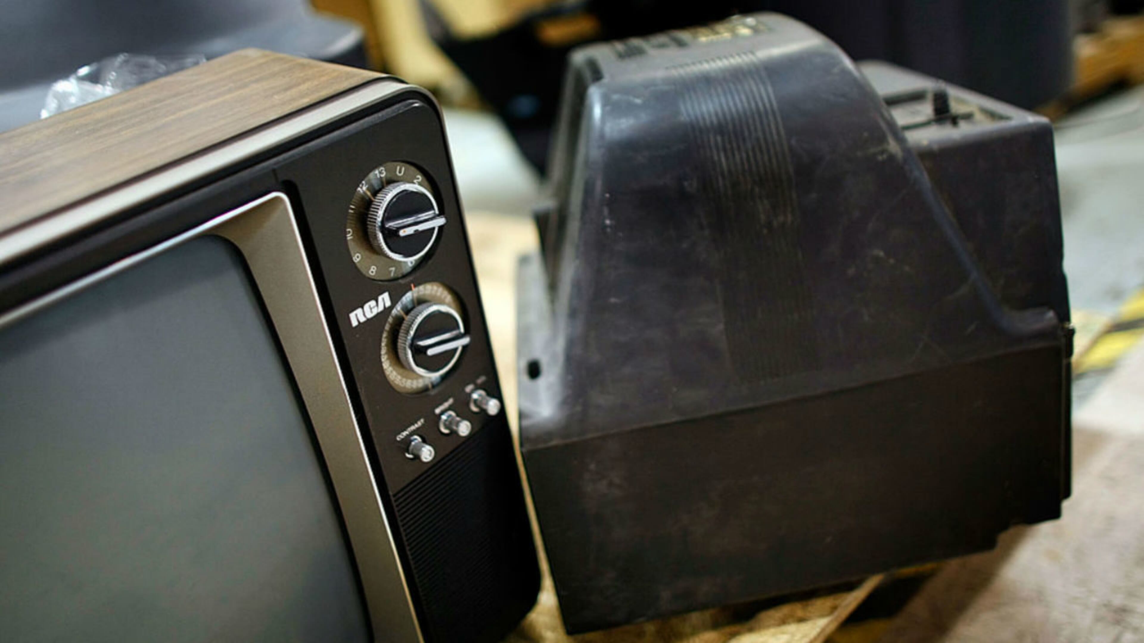 FILE PHOTO: A stranger wearing a TV on their head left dozens of old tube television sets on residents' front lawns and porches in one Virginia neighborhood.