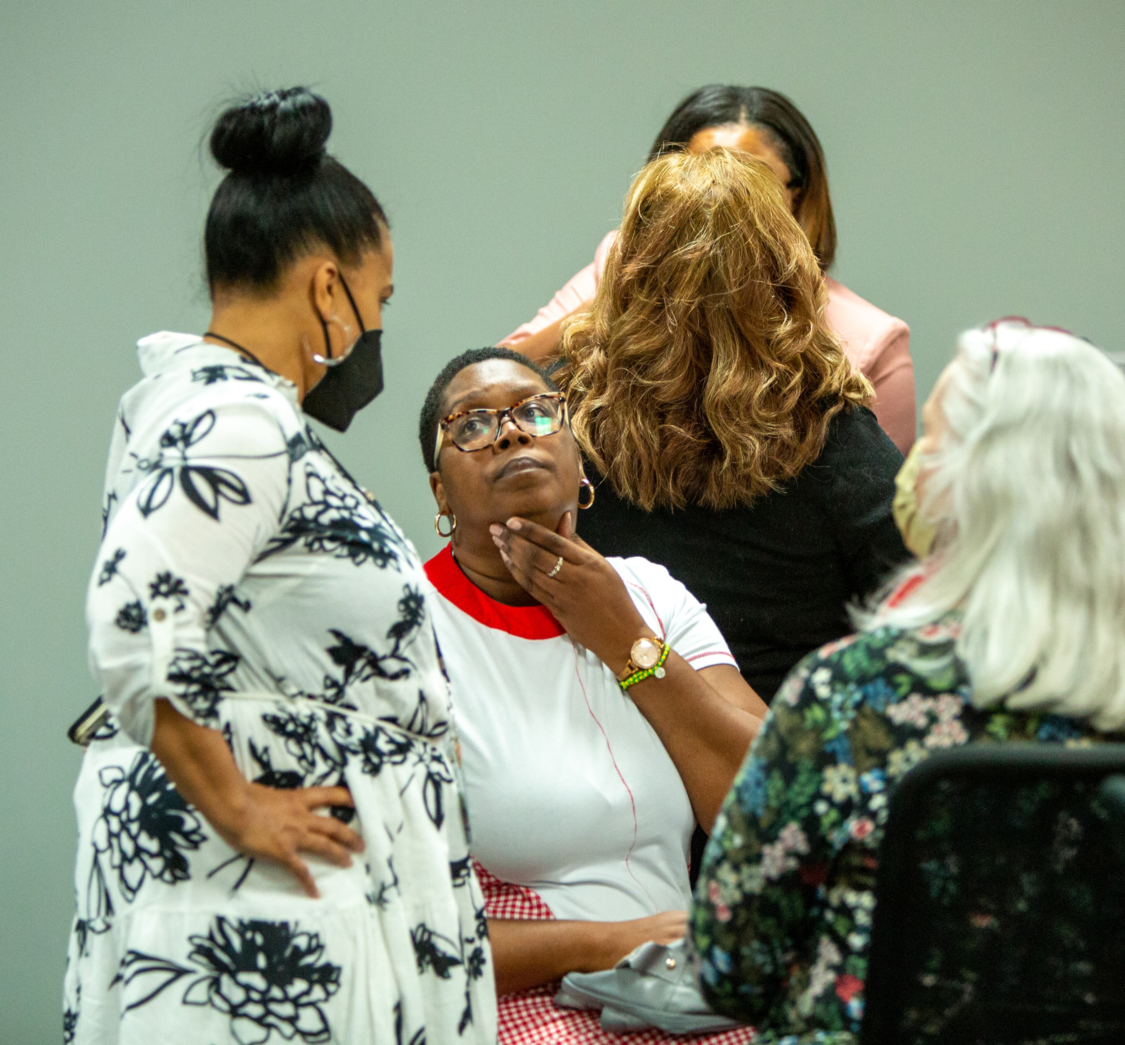 DeKalb County elections Executive Director Keisha Smith (left) and Dele Lowman Smith (seated), chairwoman of the DeKalb County elections board, talk after hours of testing machines Saturday, May 28, 2022. A recount in a County Commission race resumed Sunday. (Photo: Jenni Girtman for The Atlanta Journal-Constitution)