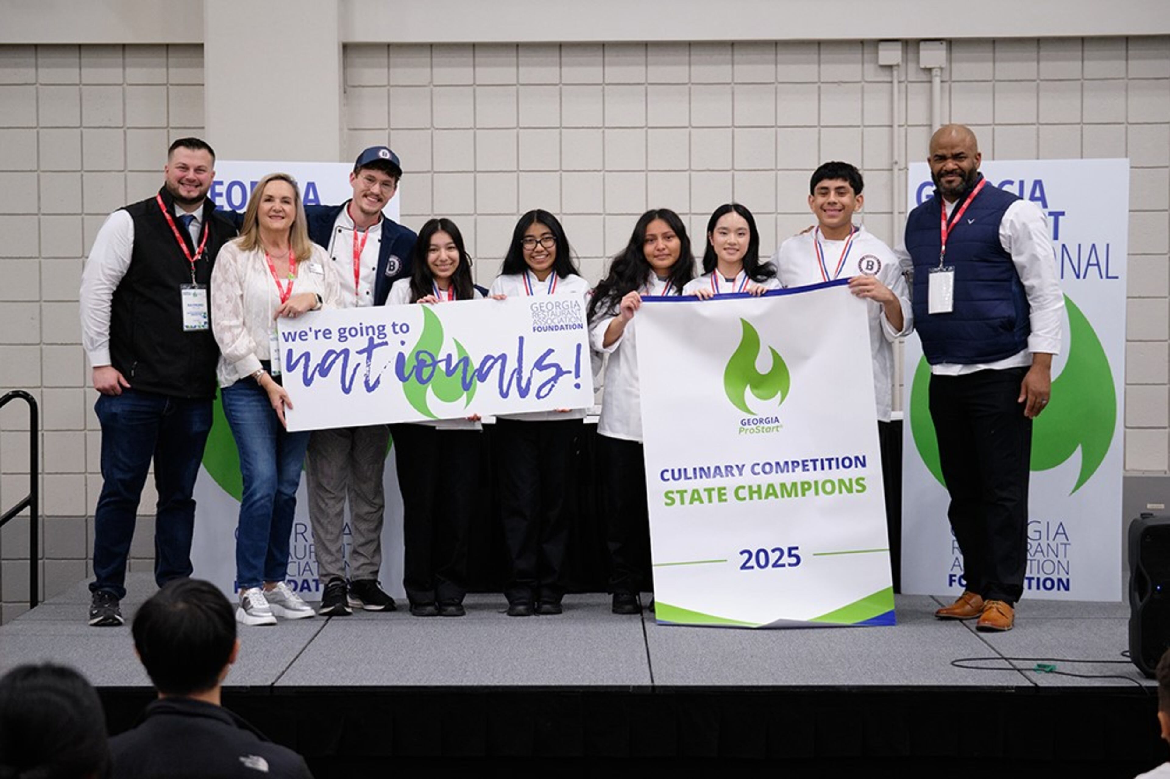 From left to right: Raymond Mesa (GRA Foundation), Stephanie Fischer (GRA), Preston Gouge (Berkmar First Year ProStart Educator), Cynthia Gutierrez, Dulce Rosas, Ismene Lopez, Kim Sy, Bryan Benitez, Chef Daryl Shular (Lead Culinary Judge). March 28, 2025 (Credit: Brandon Amato, courtesy of GRA)