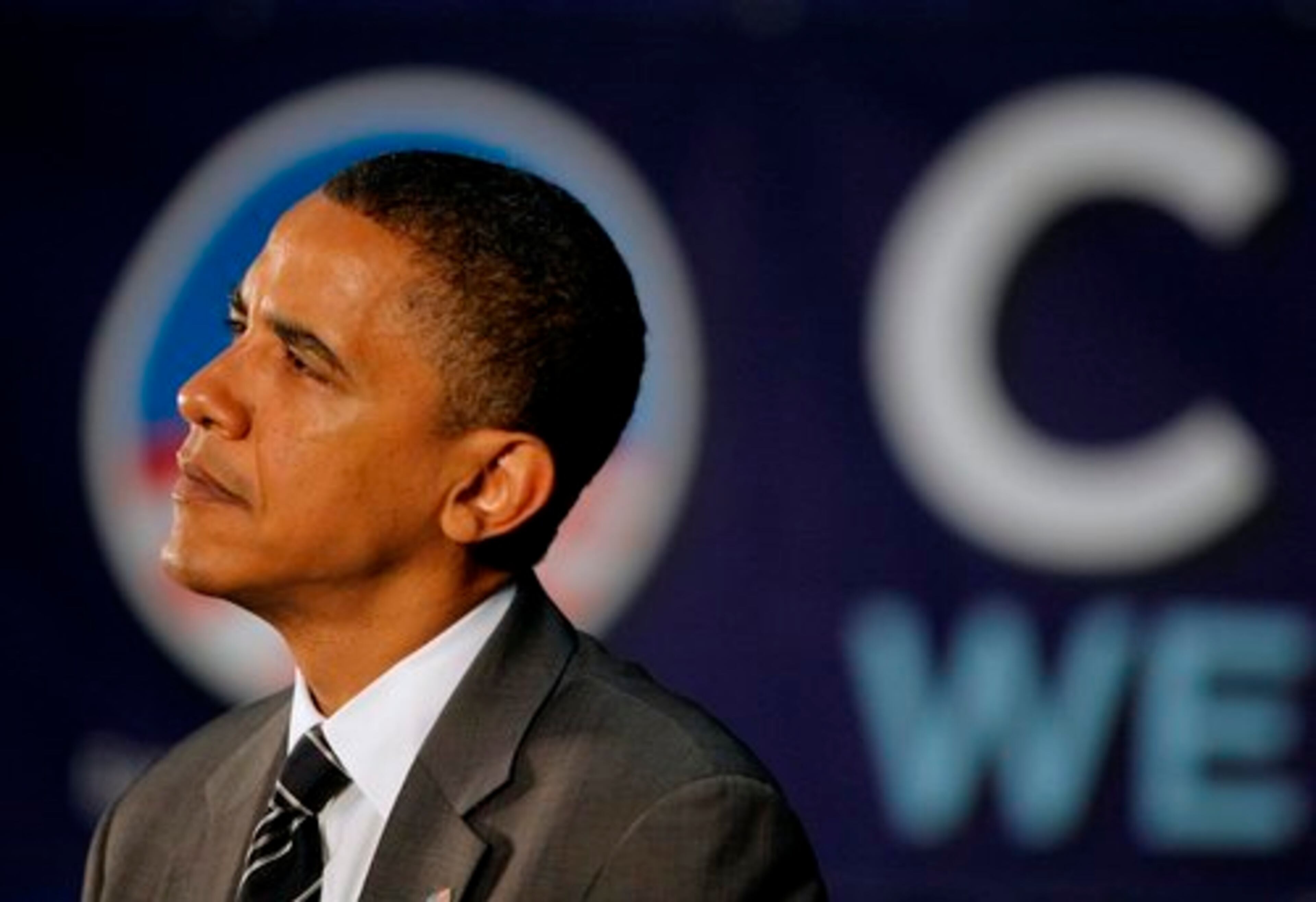 Democratic presidential candidate, Sen. Barack Obama, watches as he is introduced at a town hall-style meeting in Powder Springs.