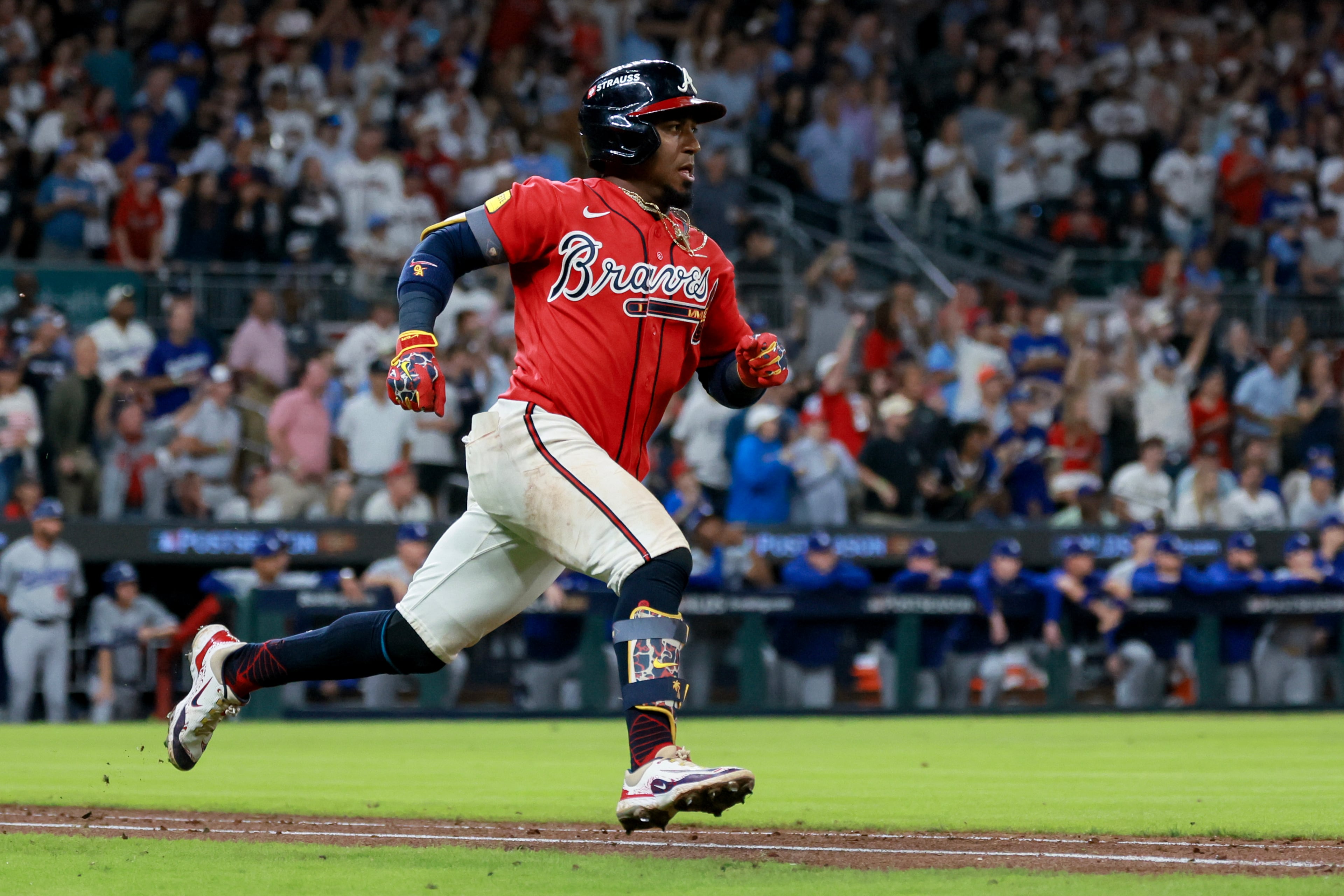 Atlanta Braves' Ozzie Albies (1) hits leadoff double against the Los Angeles Dodgers during the ninth inning of Game 3 of the MLB National League Division Series between the Atlanta Braves and the Los Angeles Dodgers, Tuesday, Oct. 6, 2026, in Atlanta. (Jason Getz/AJC)