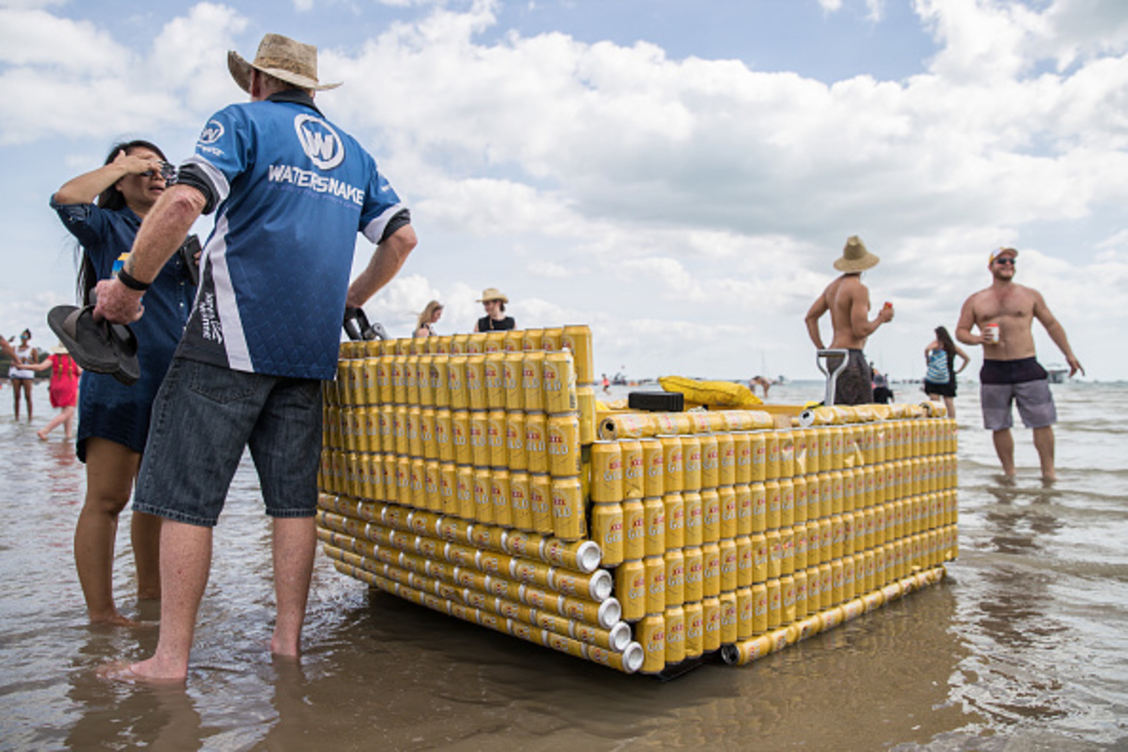 DARWIN, AUSTRALIA - JULY 09: Owen Richards and Dan O'Driscoll during the Darwin Beer Can Regatta at Mindil Beach on July 9, 2017 in Darwin, Australia. The annual event first started in 1974 as a way to clean up beer cans littering local streets. The all-day event includes boat races alongside thong throwing and sandcastle competitions. (Photo by Helen Orr/Getty Images)