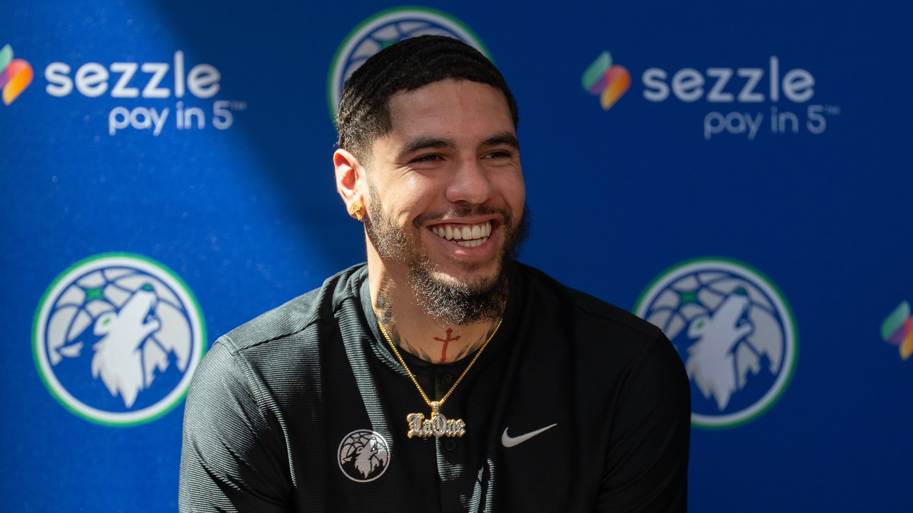 Minnesota Timberwolves newly-acquired point guard LaMelo Ball laughs during an introductory press conference at the Target Center in Minneapolis on Tuesday, July 14, 2026. (Alex Kormann/Minnesota Star Tribune via AP)