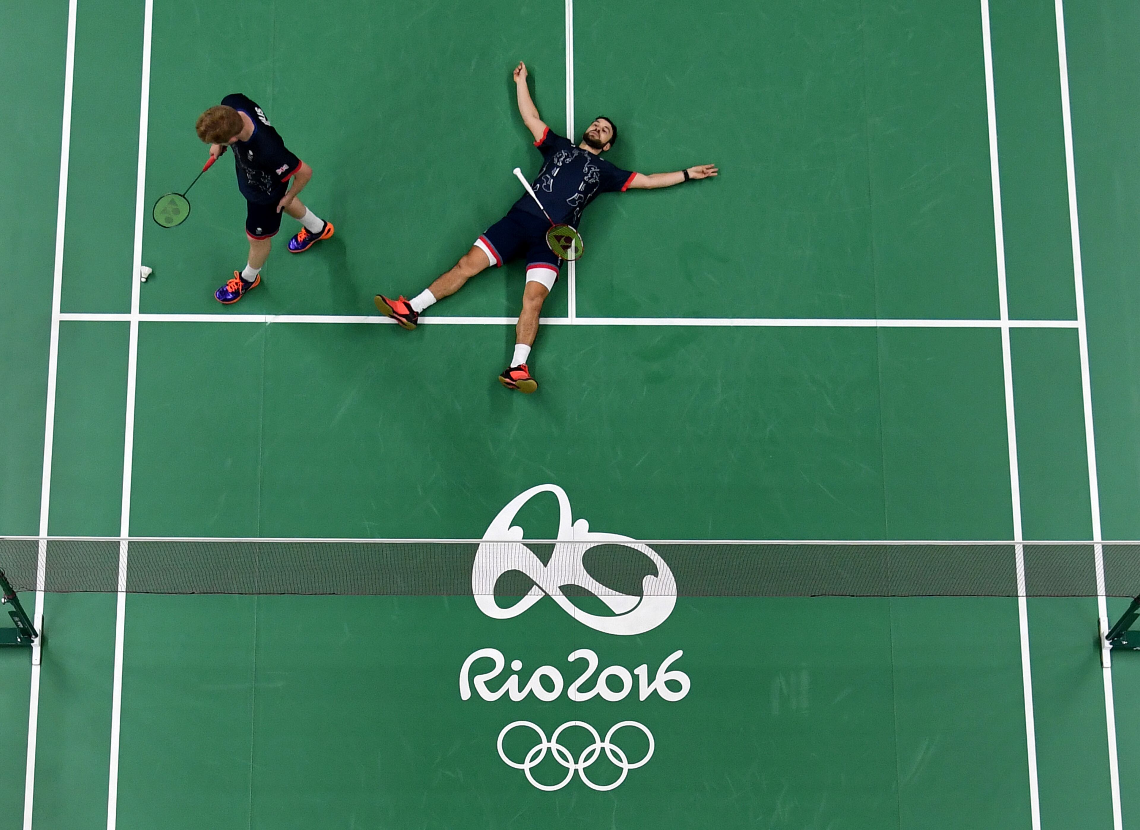 RIO DE JANEIRO, BRAZIL - AUGUST 16: Marcus Ellis and Chris Langridge of Great Britain react to losing a point against Fu Haifeng and Zhang Nan of China in the Badminton Men's Doubles Semi-Final at Riocentro - Pavilion 4 on August 16, 2016 in Rio de Janeiro, Brazil. (Photo by Richard Heathcote/Getty Images)