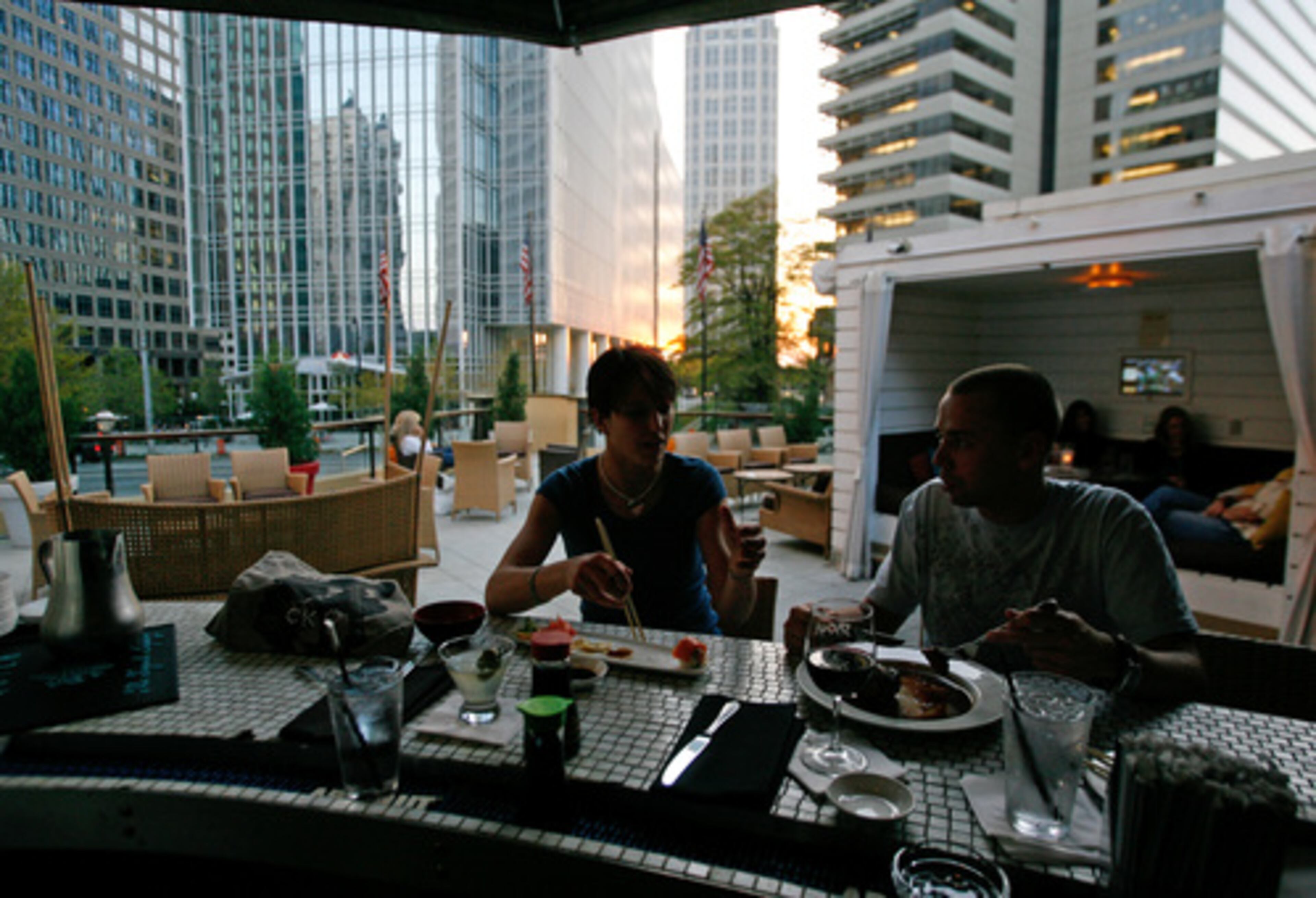 "I LOVE THE ENVIRONMENT in the middle of the city," said Nikki Kieliszak (right), dining with Jeff Moore at Shout.