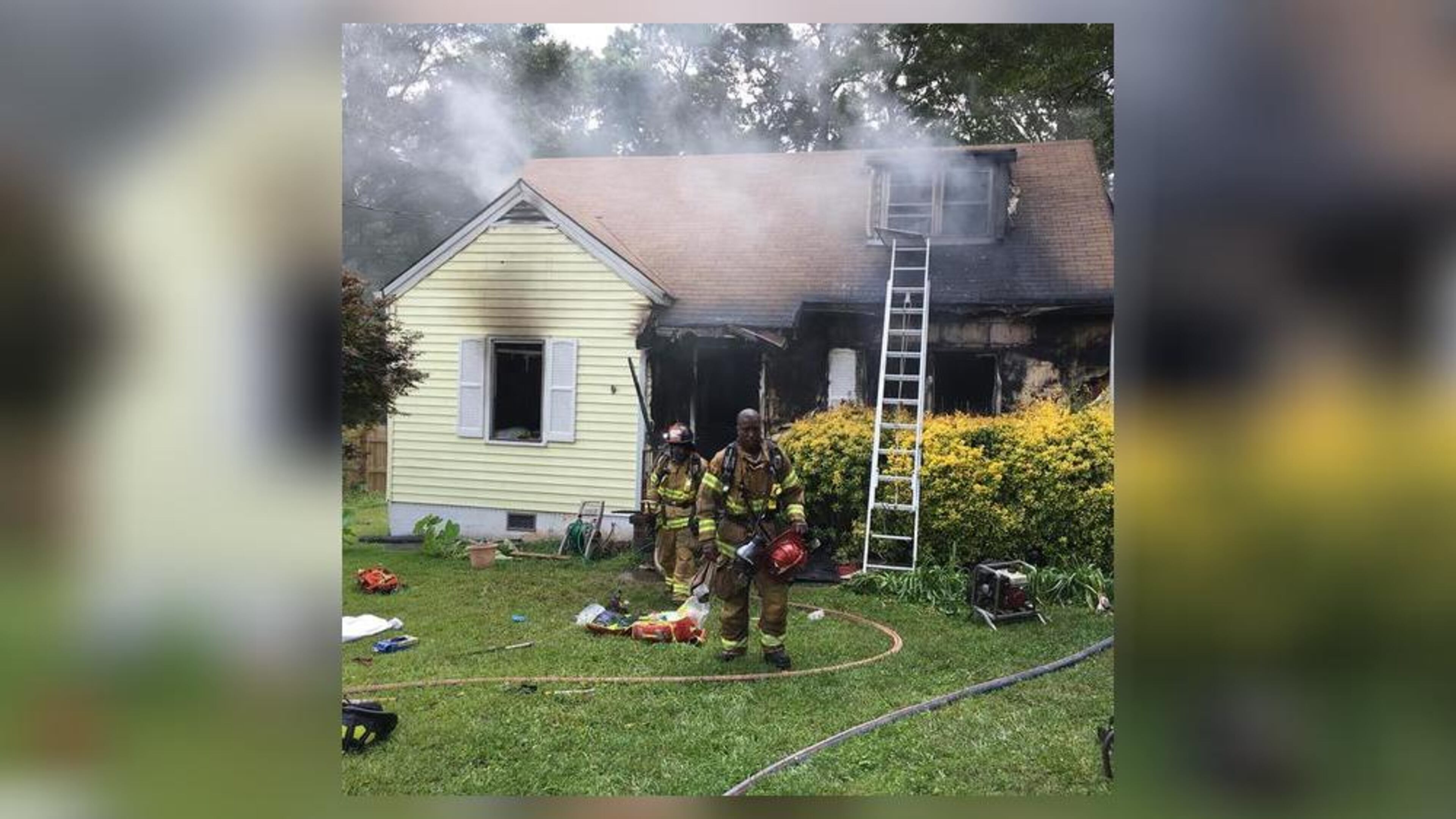 DeKalb County firefighters battle a blaze Sunday on Medlock Road.