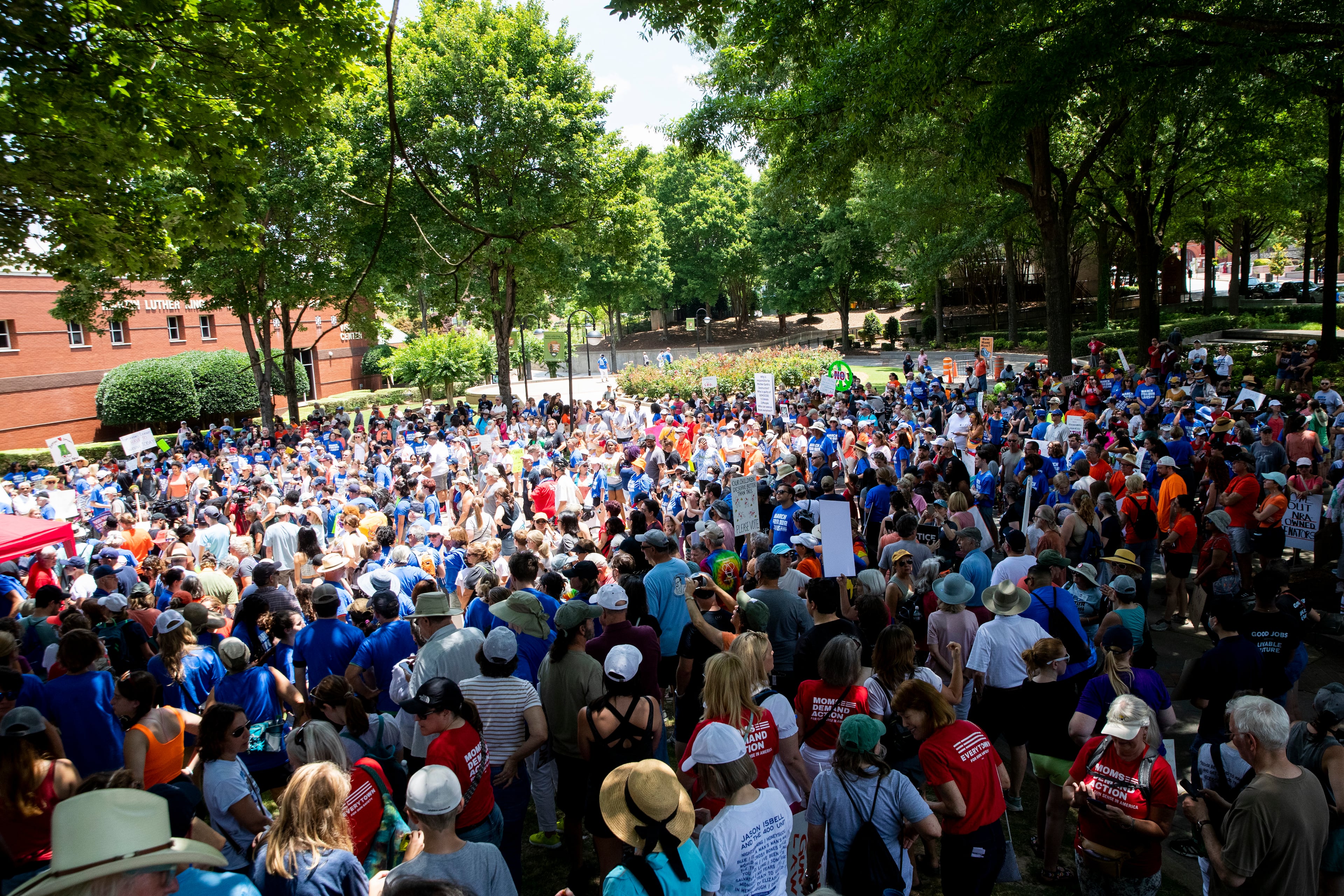 Protesters gather at the Martin Luther King National Historical Park during a March for Our Lives rally prior to a march to Woodruff Park on Saturday, June 11, 2022, in Atlanta. (Chris Day / Christopher.Day@ajc.com)