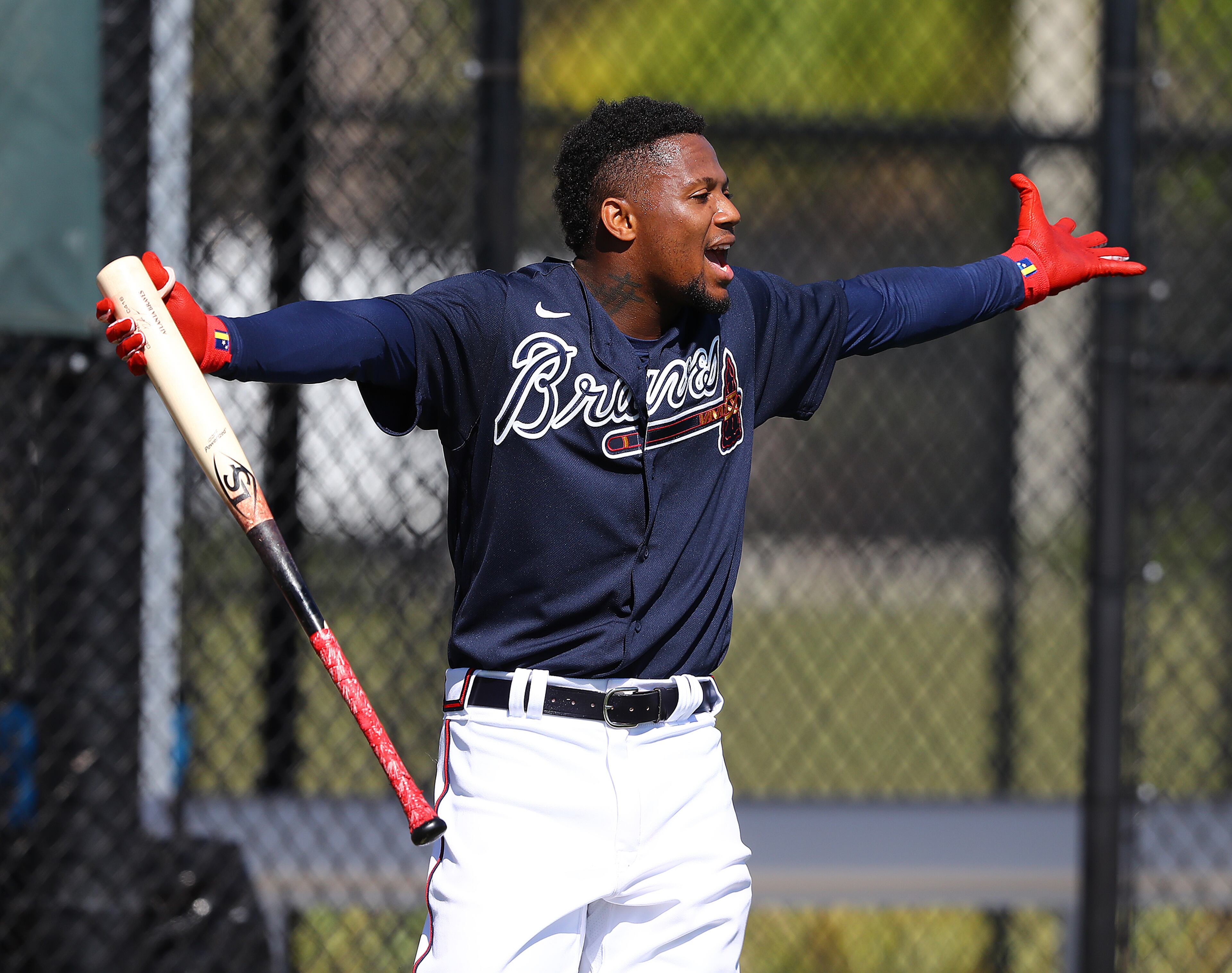 Braves' Ronald Acuna clowns around with the outfielders while taking batting practice during Spring Training on Thursday, March 17, 2022, in North Port. “Curtis Compton / Curtis.Compton@ajc.com”