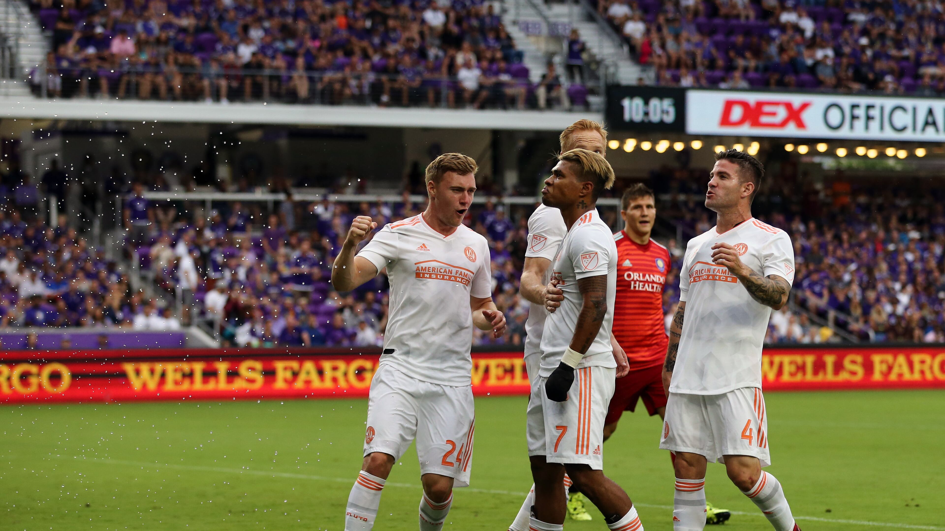 Water from bottles can be seen on the left from debris thrown onto the field from some Orlando City supporters during Sunday's 2-1 loss to Atlanta United. (Atlanta United)