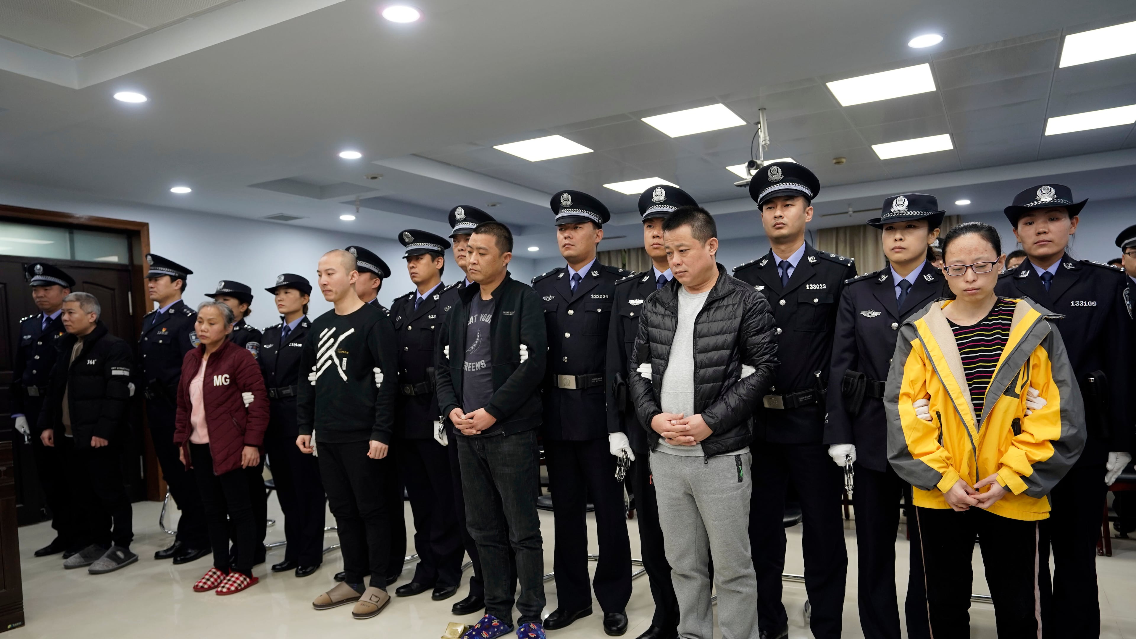 FILE - A trial continues as fentanyl drug traffickers are sentenced in court, Thursday, Nov. 7, 2019, in Xingtai, north China's Hebei Province. (Jin Liangkuai/Xinhua via AP, File)