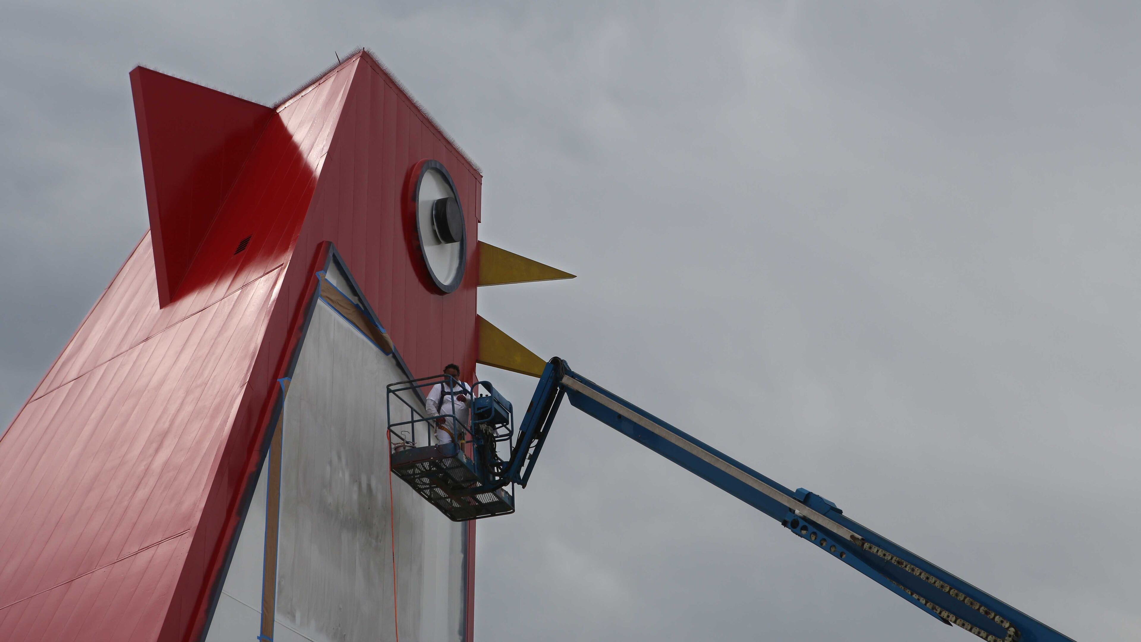Marlon Ramirez paints the Big Chicken in Marietta, Georgia, on Wednesday. It's undergoing its first real renovation in years.