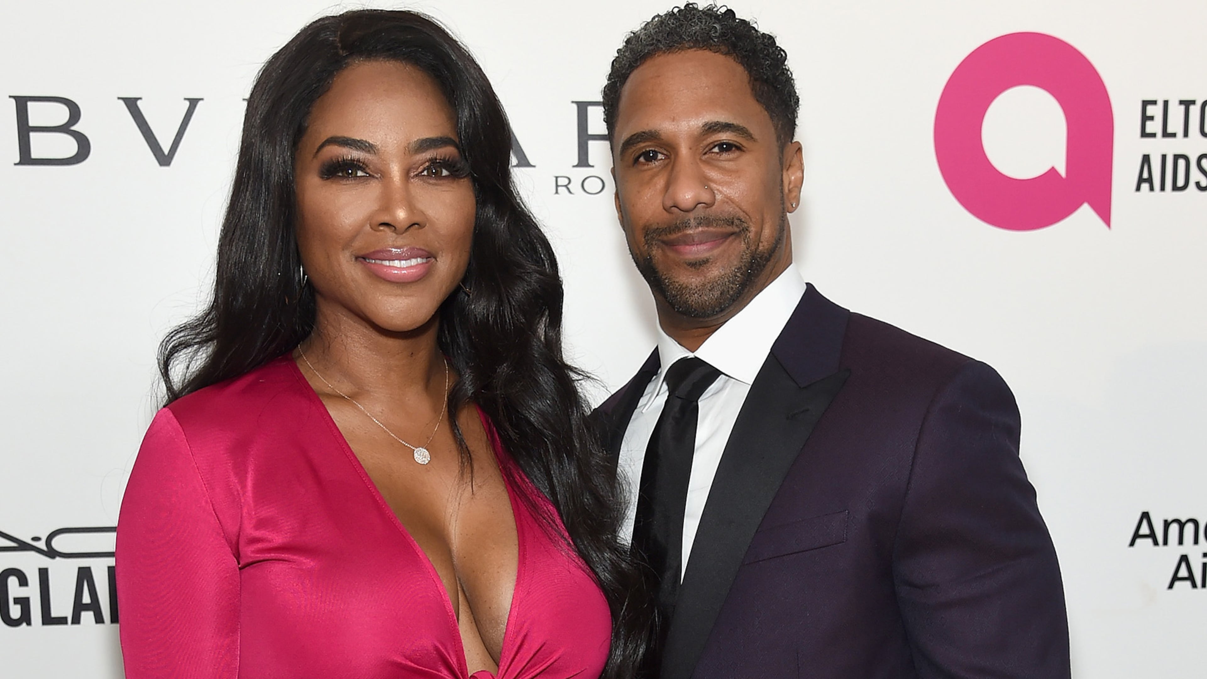 WEST HOLLYWOOD, CA - MARCH 04: (L-R) Kenya Moore and Marc Daly attend the 26th annual Elton John AIDS Foundation's Academy Awards Viewing Party at The City of West Hollywood Park on March 4, 2018 in West Hollywood, California. (Photo by Jamie McCarthy/Getty Images for EJAF)