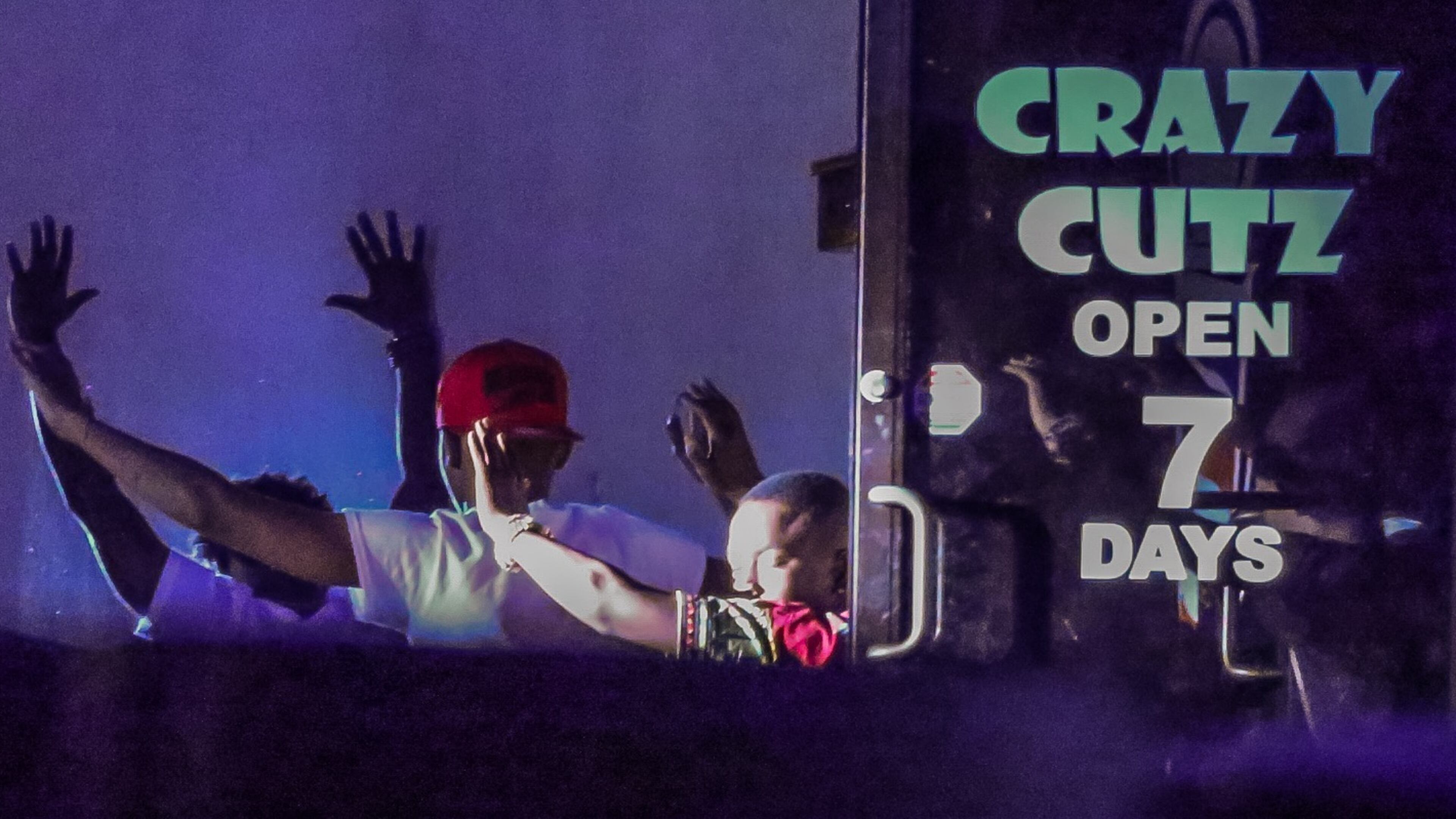 At least three people came out of a northwest Atlanta barbershop with their hands behind their heads hours after police said possibly armed teenagers were held up Mon., June 6, 2016, inside the barbershop. JOHN SPINK / JSPINK@AJC.COM