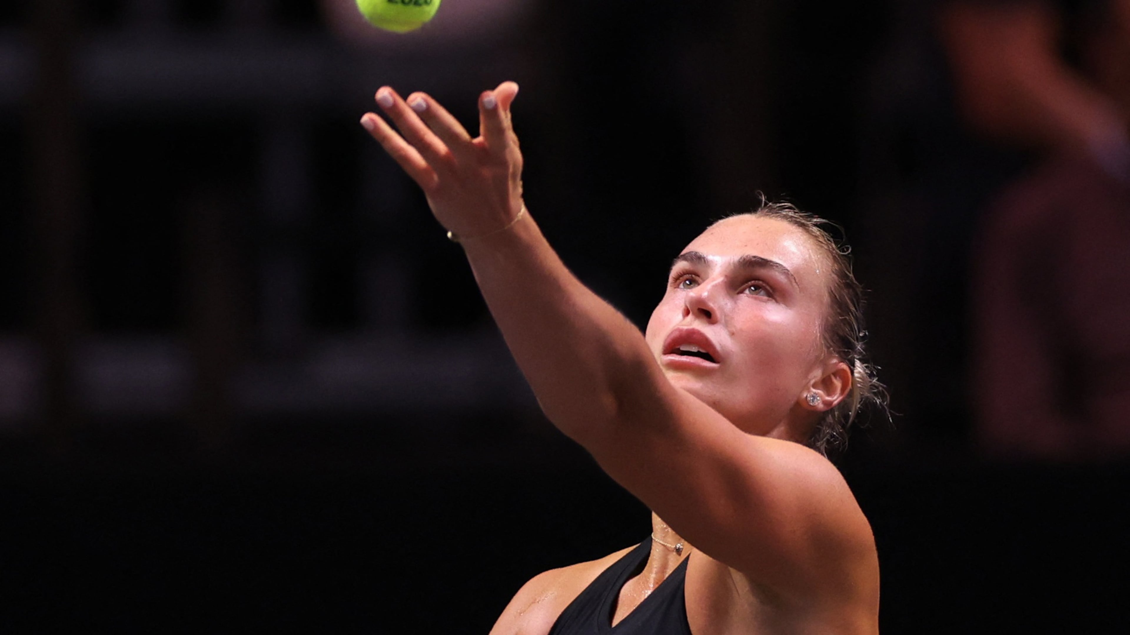 Aryna Sabalenka serves against Nick Kyrgios during their Battle of the Sexes tennis match, in Dubai, United Arab Emirates, Sunday Dec. 28, 2025. (Amr Alfiky/Pool Photo via AP)