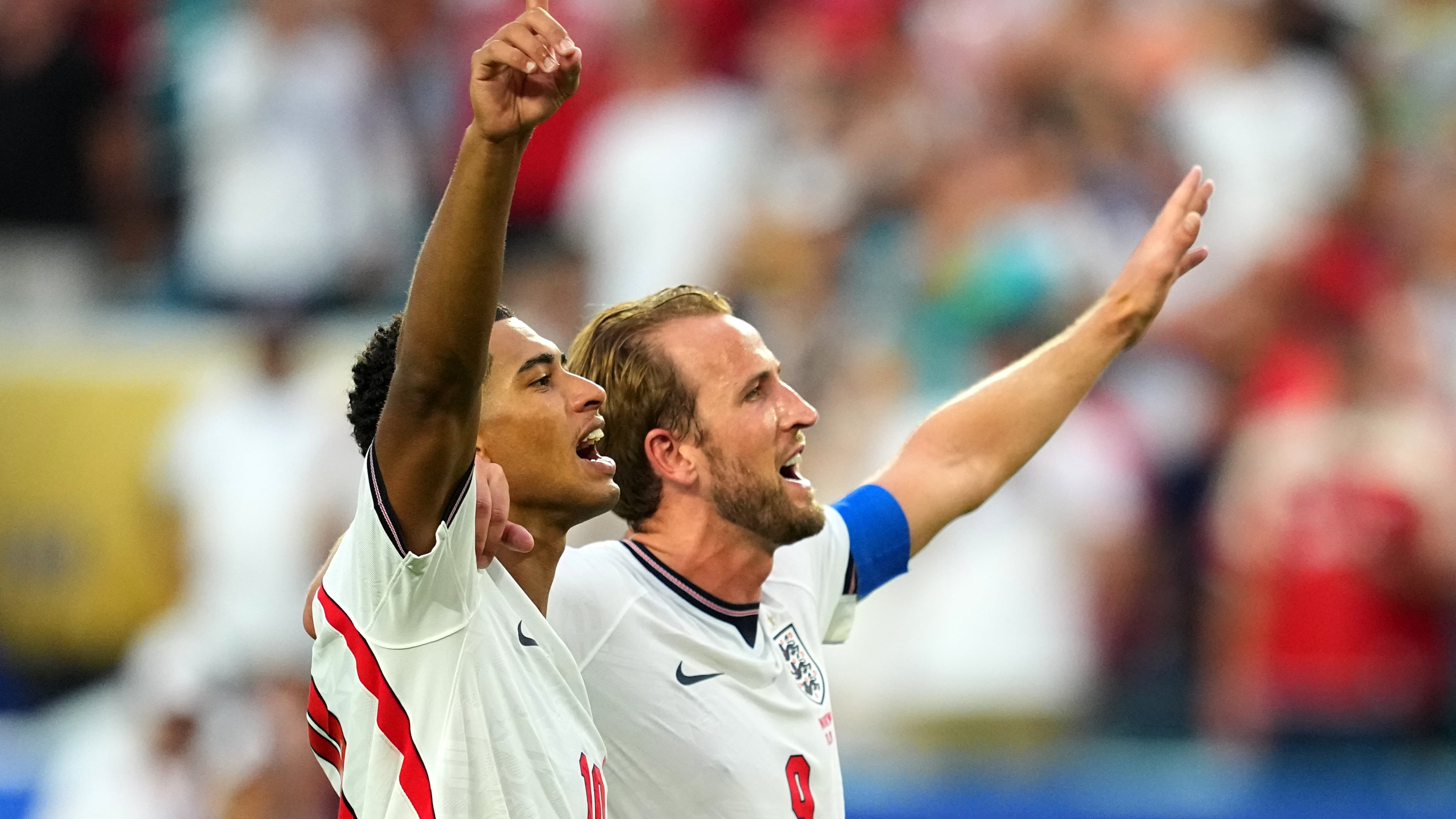 Jude Bellingham, left, and Harry Kane celebrates England's victory over Norway in a World Cup quarterfinal soccer match in Miami Gardens, Fla., Saturday, July 11, 2026. (AP Photo/Julio Cortez)