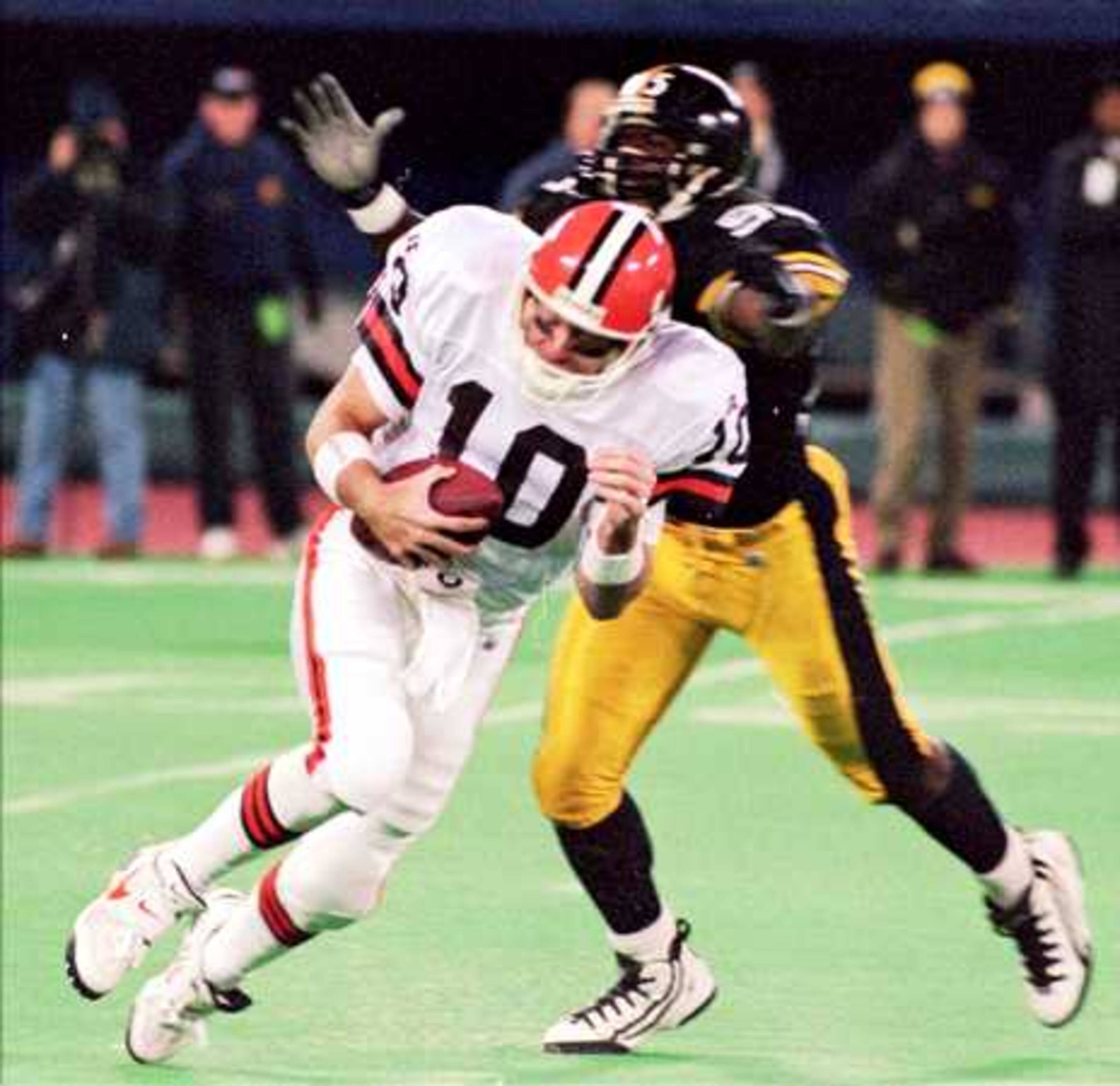 Lloyd sacks Cleveland Browns quarterback Eric Zeier (10) during a game in November 1995.