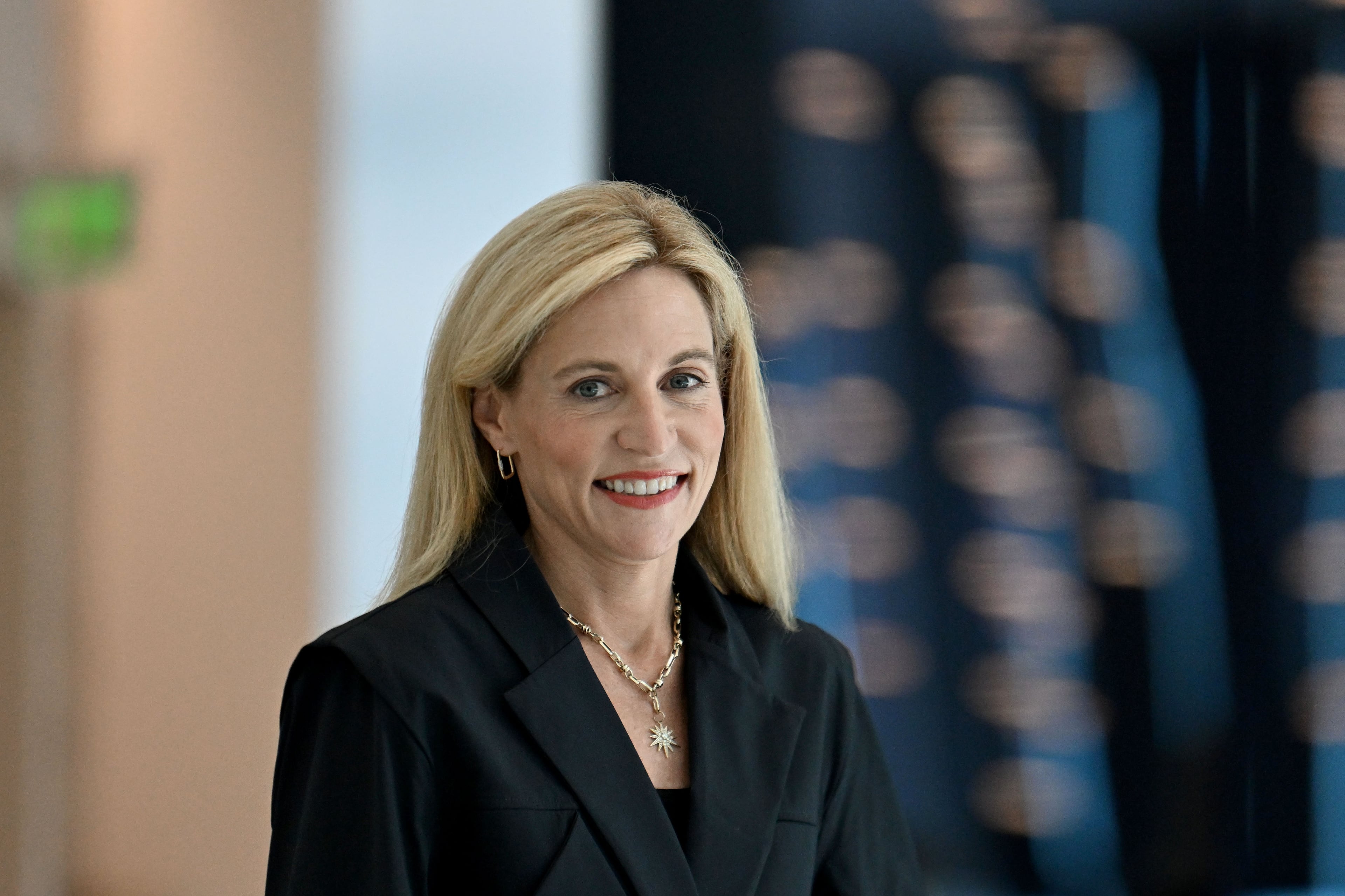 Allison Dukes, senior managing director and chief financial officer of Invesco, poses for a portrait at Invesco's global corporate headquarters on Wednesday, Aug. 12, 2026, in Atlanta. (Hyosub Shin/AJC)