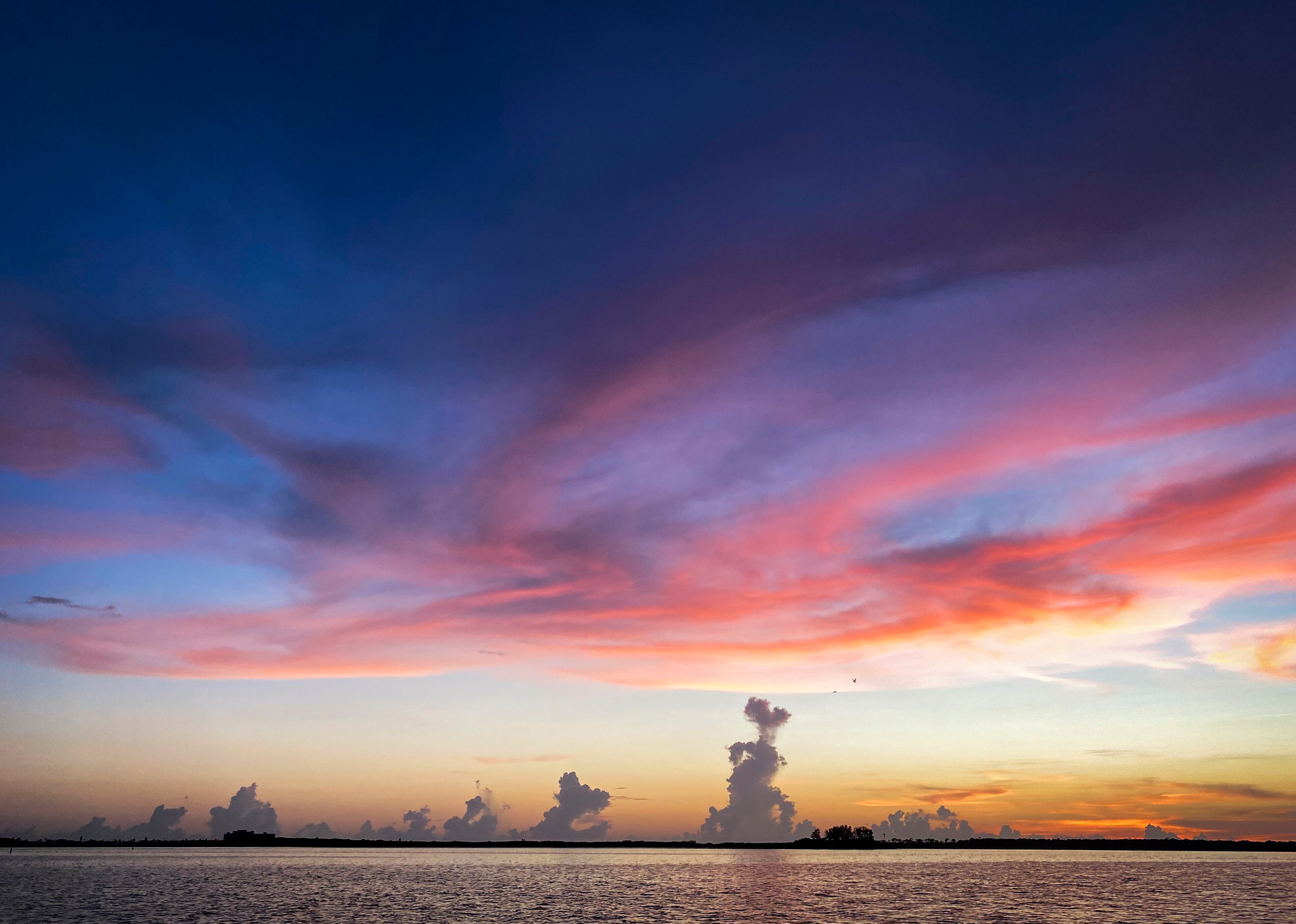 Towering clouds and a colorful sky over the north end of Clearwater Beach. (Chris Urso/Tampa Bay Times/TNS)