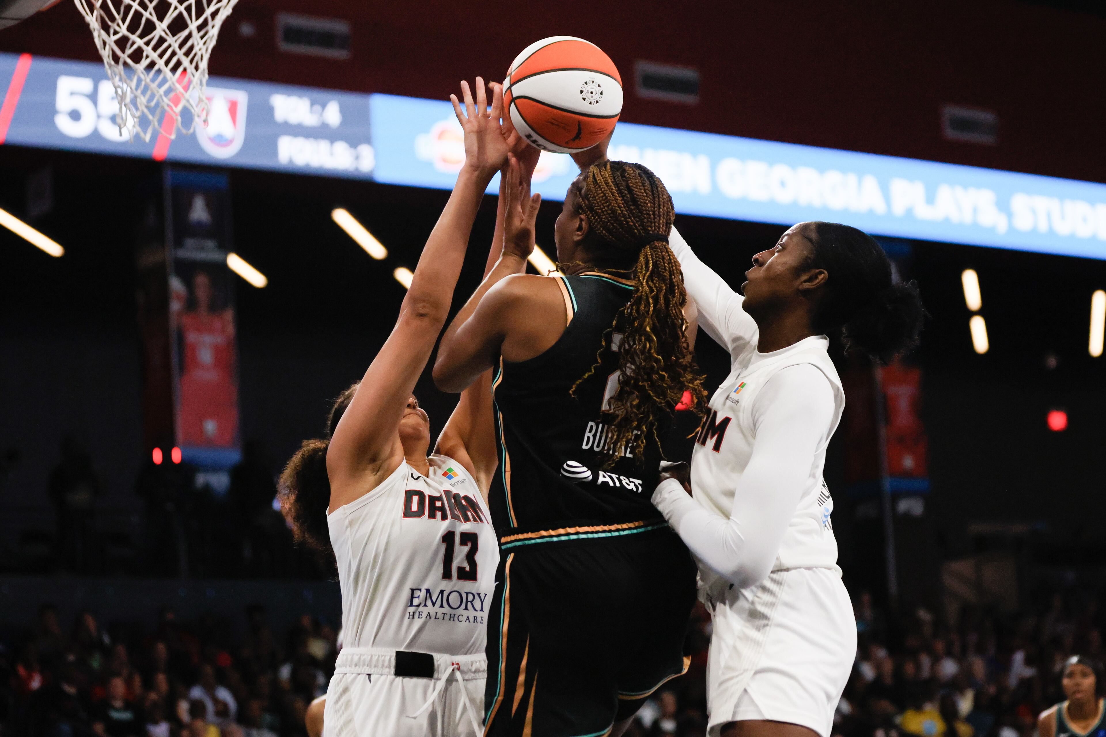 Atlanta Dream forward Laeticia Amihere (right) blocks a shot from New York Liberty forward Kennedy Burke (center) during the second half on Sunday, June 23, 2024, in Atlanta, at Gateway Center Arena.
(Miguel Martinez / AJC)