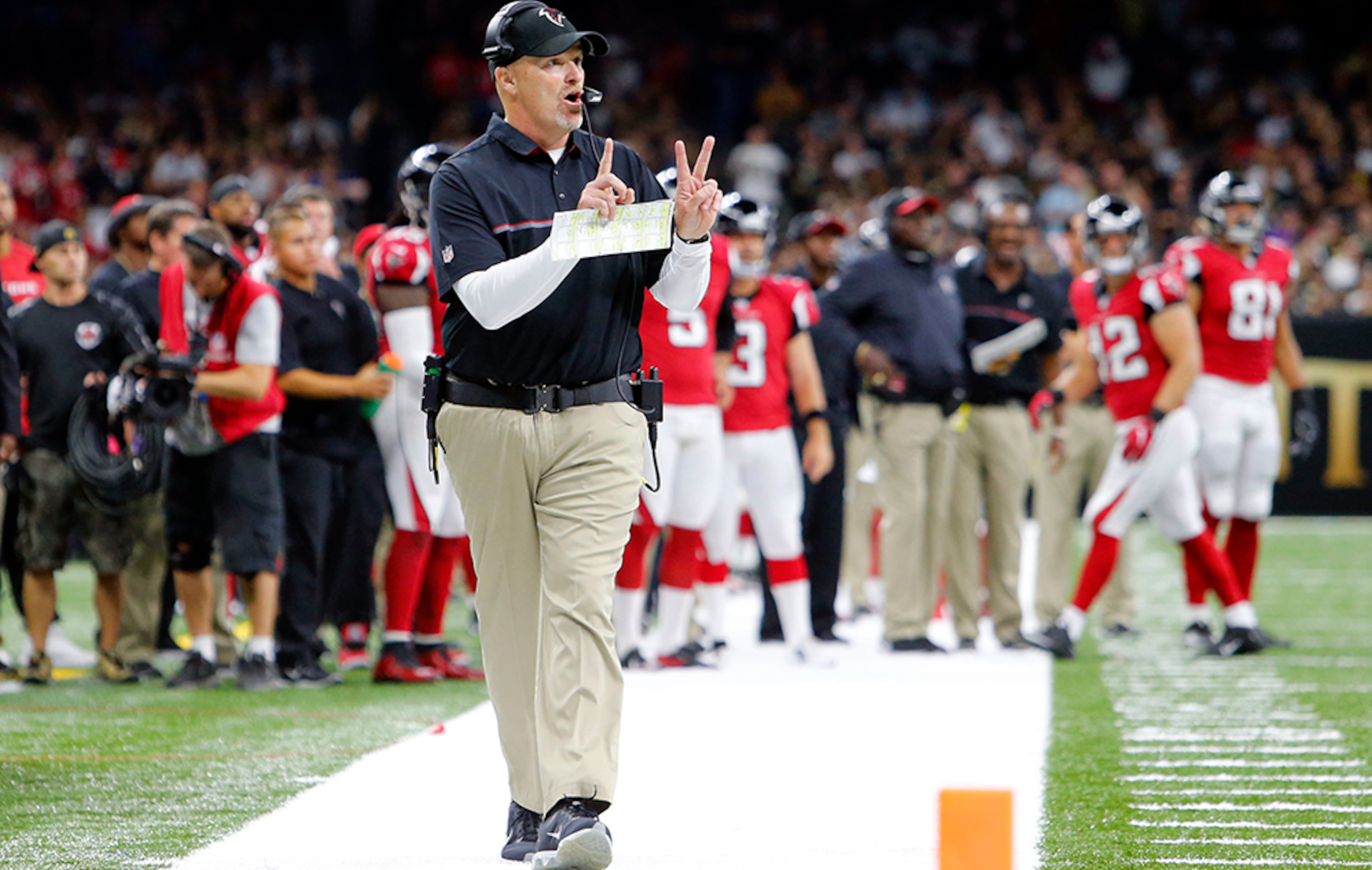 Atlanta Falcons head coach Dan Quinn walks on the sideline in the first half against the New Orleans Saints in New Orleans, Monday, Sept. 26, 2016.
