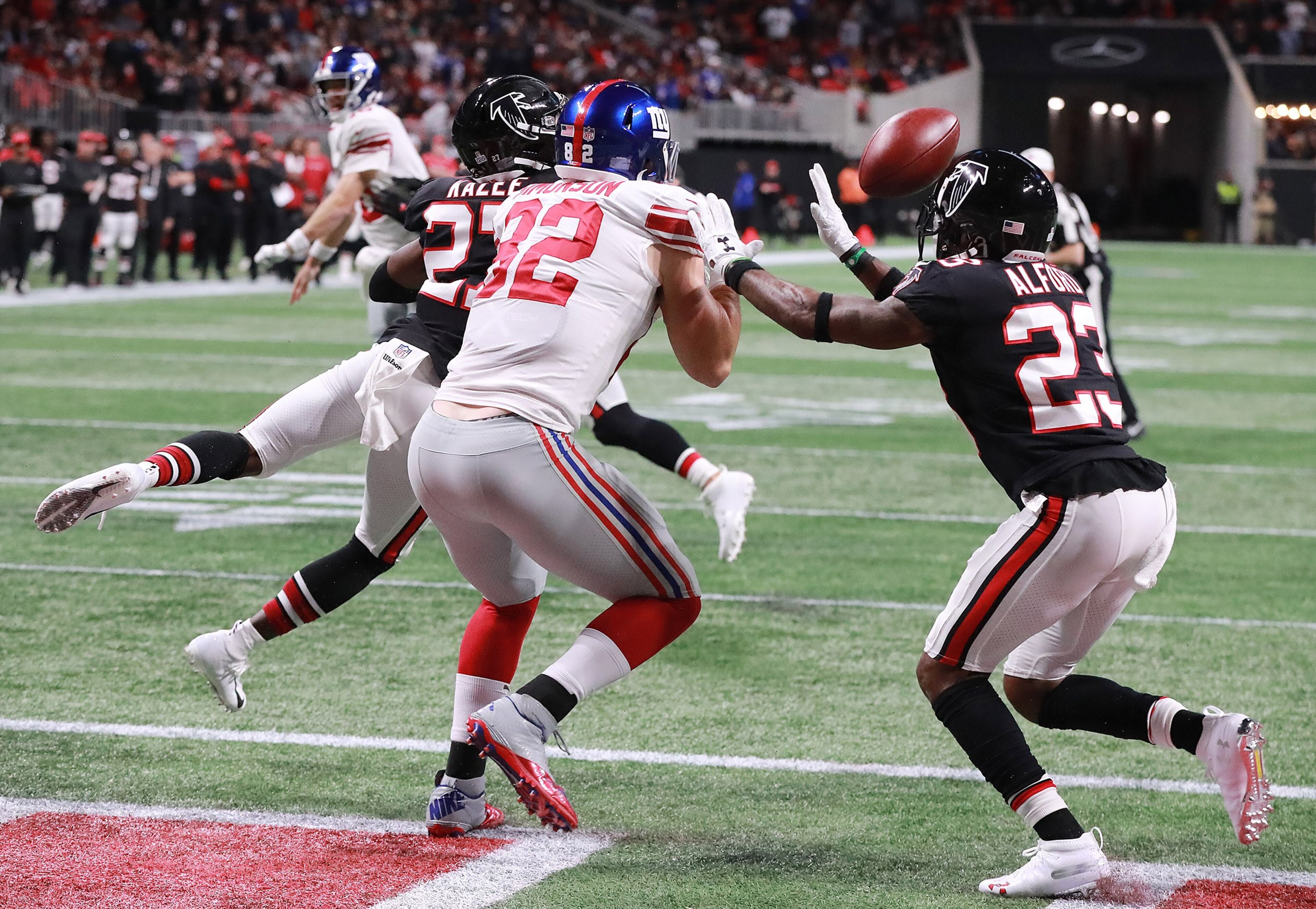 October 22, 2018 Atlanta: Atlanta Falcons safety Damontae Kazee (left) and cornerback Robert Alford break up a pass in the endzone to New York Giants tight end Scott Simonson on a fourth and one attempt to take over on downs during the third quarter in a NFL football game on Monday, Oct 22, 2018, in Atlanta. Curtis Compton/ccompton@ajc.com