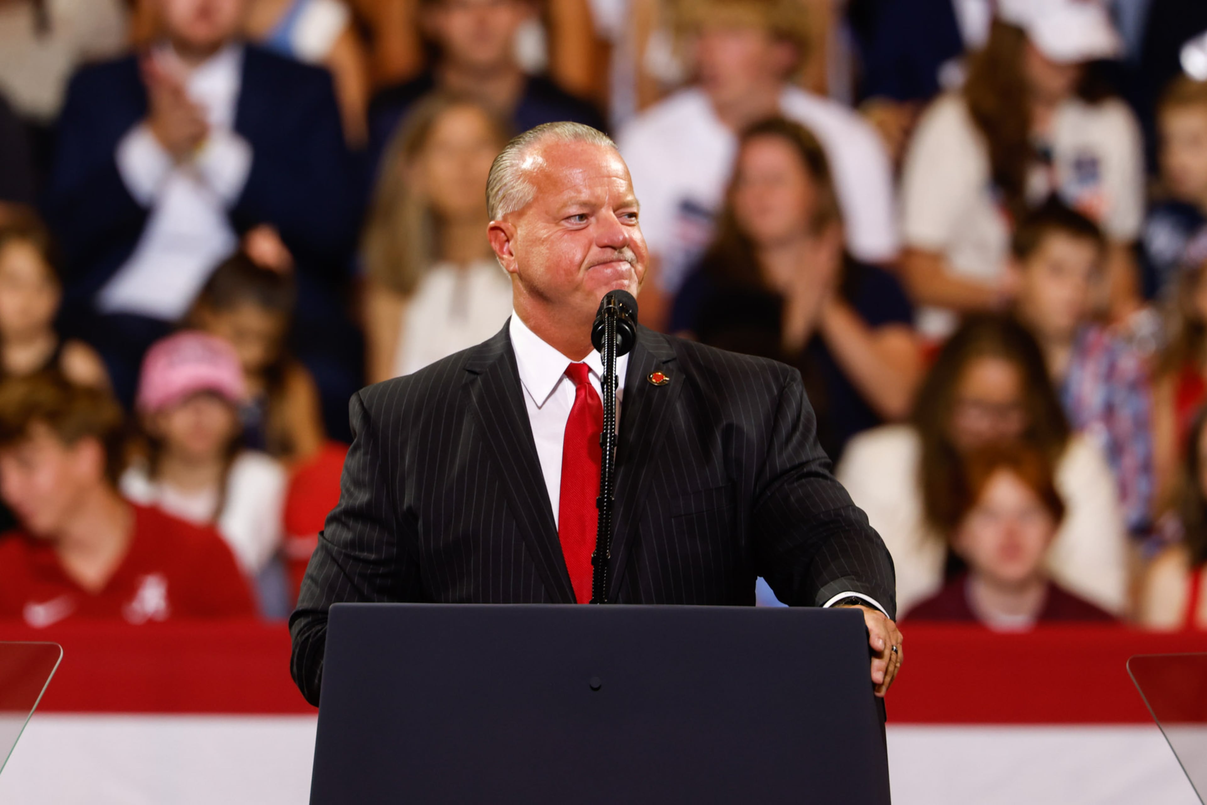 Cobb County Superintendent Chris Ragsdale speaks at President Donald Trump’s rally at Wheeler High School in Marietta on July 22, 2026. (Arvin Temkar/AJC)