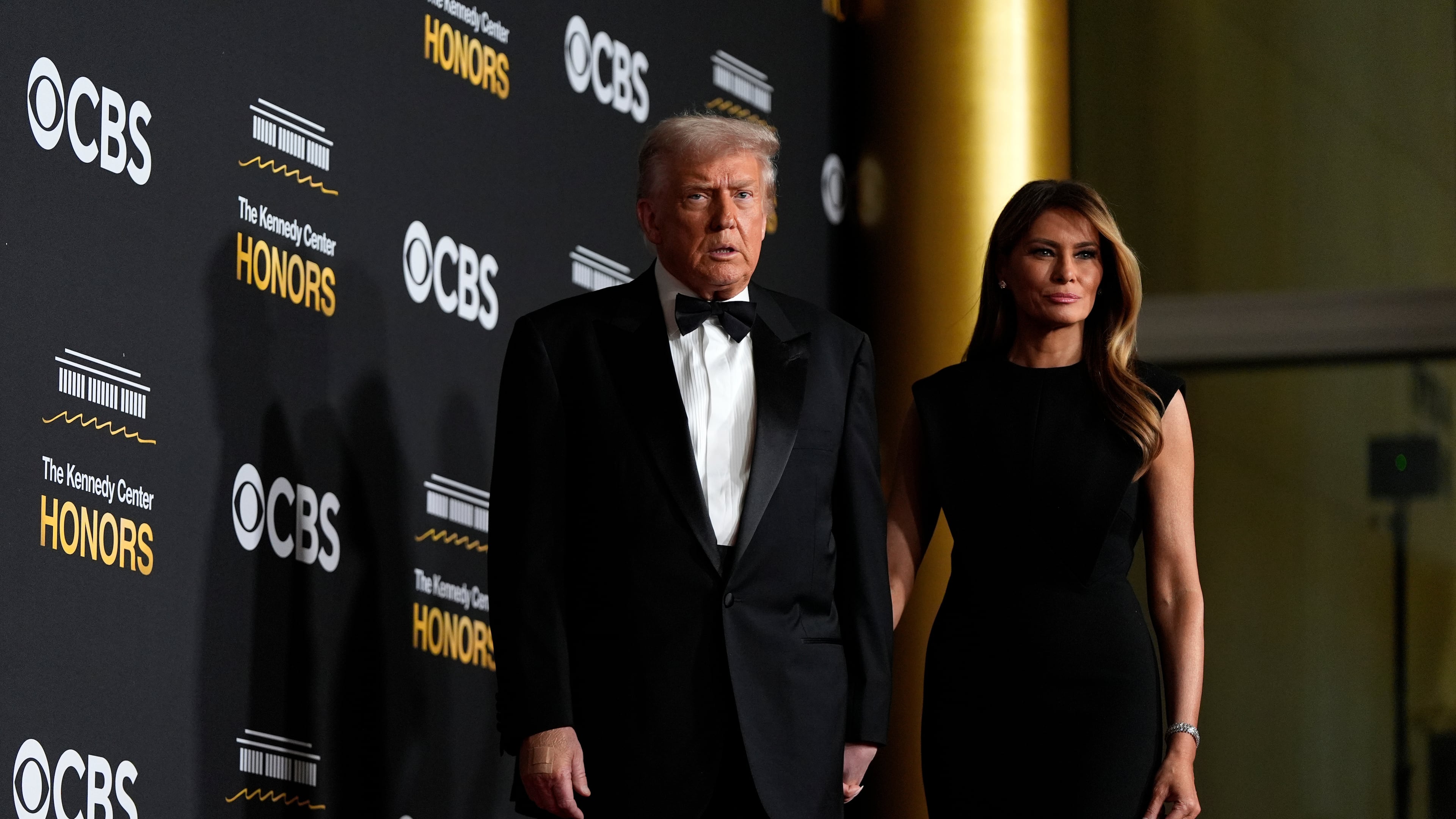 FILE - President Donald Trump and first lady Melania Trump, walk the red carpet before the 48th Kennedy Center Honors, Dec. 7, 2025, at the John F. Kennedy Center for the Performing Arts in Washington. (AP Photo/Julia Demaree Nikhinson, file)