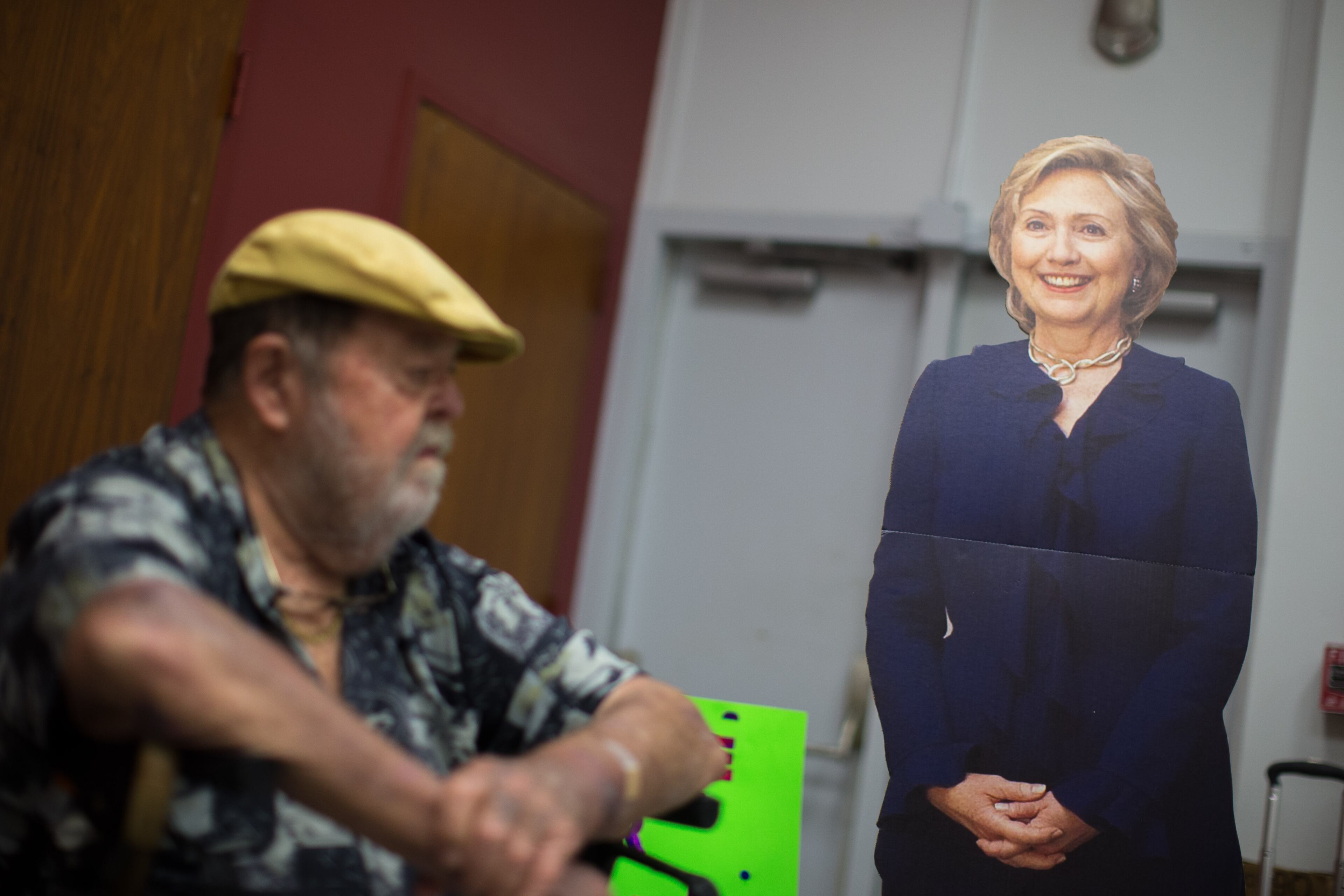 Delegate Alvin Leaphart sits near a cardboard cutout of Democratic presidential candidate Hillary Clinton at the IBEW Local 613 Auditorium, Saturday, June 11, 2016, in Atlanta. Members of the Georgia Democratic Party gathered to elect at-large and alternate delegates to the Democratic National Convention in Philadelphia. BRANDEN CAMP/SPECIAL