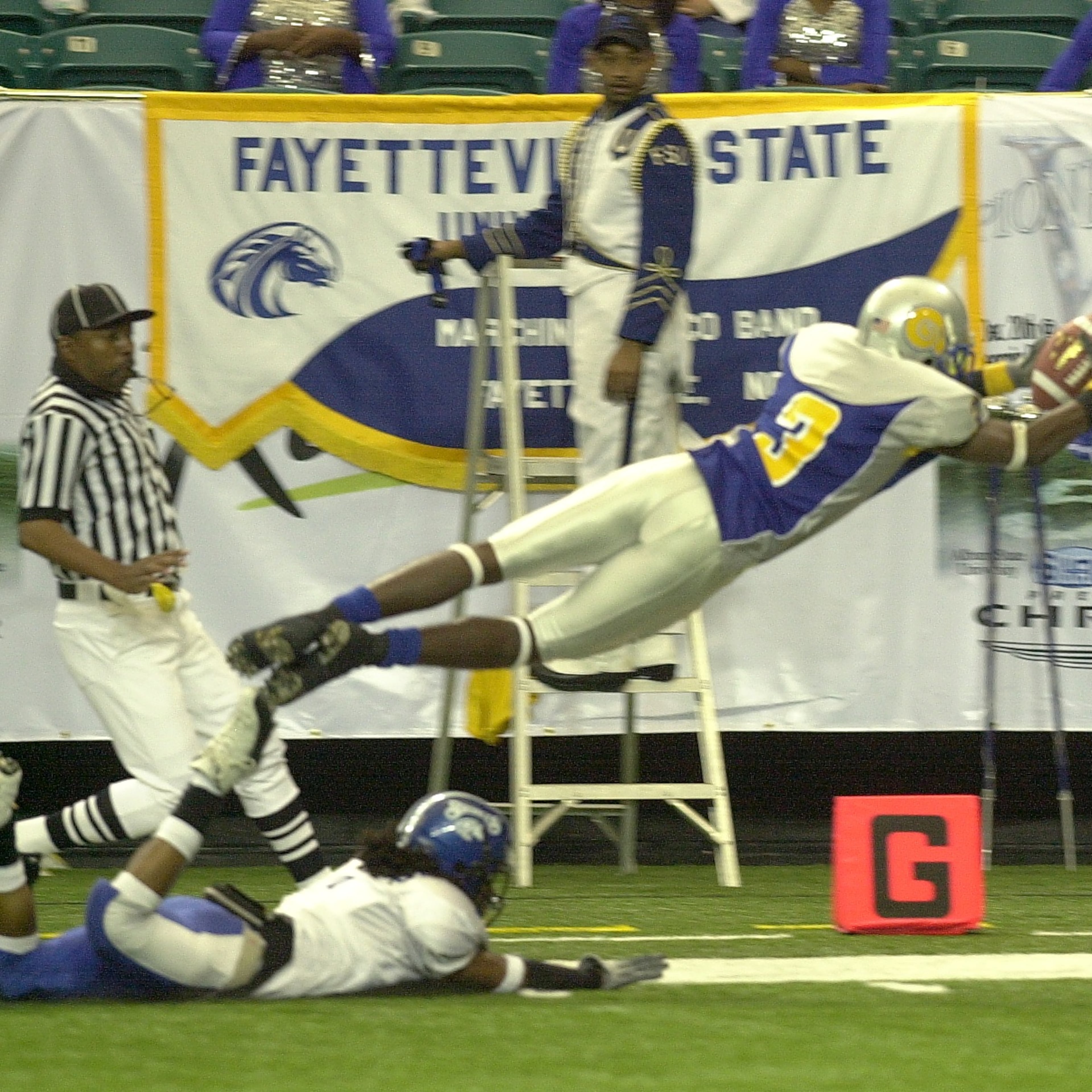 Albany State wide receiver Alvin Ray Jackson dives for a touchdown in the first quarter of the 2003 Pioneer Bowl against Fayetteville State. The Golden Rams won 52-30 to cap a 10-2 season. (W.A. Bridges Jr./AJC)