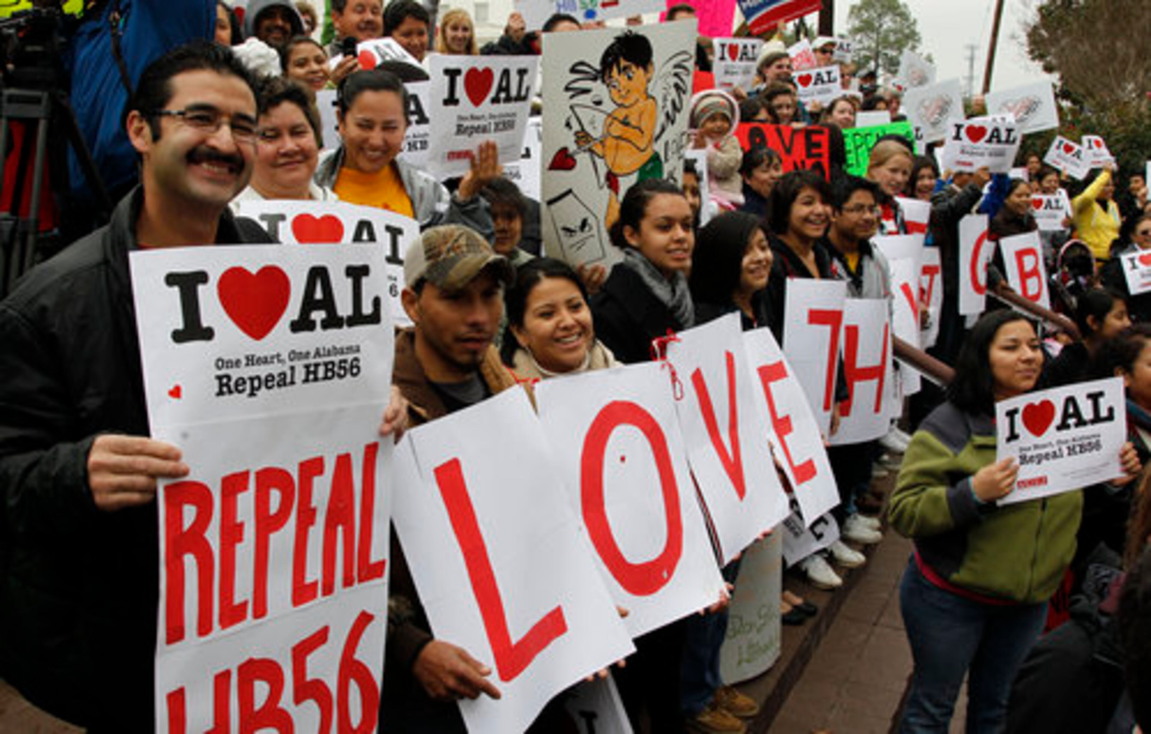 Immigration law protestors gather outside the Alabama Statehouse in Montgomery, Ala., Tuesday, Feb. 14, 2012. About 400 demonstrators protested House Bill 56 which is considered one of the strongest immigration laws in the nation. Gov. Nathan Deal signed HB 87 -- similar to Alabama's bill -- into law in May, hailing it as a victory for taxpayers who have borne the cost of illegal immigration in Georgia.