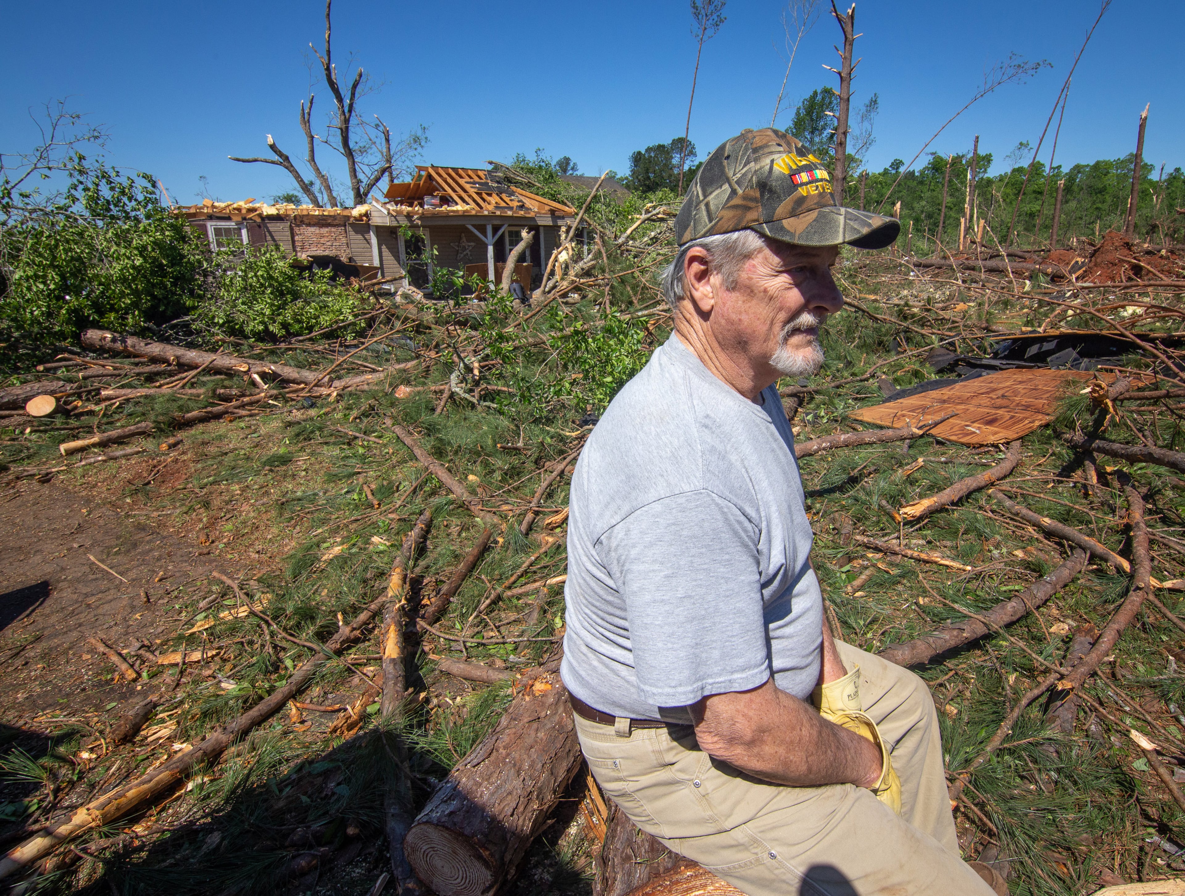 Buch McDaniel sits in from of his tornado-damaged Trinity Road home in Thomaston, GA. Monday, April 13, 2020. McDaniel said he and his wife barely made it to their safe room before the tornado severely damaged their house. STEVE SCHAEFER / SPECIAL TO THE AJC