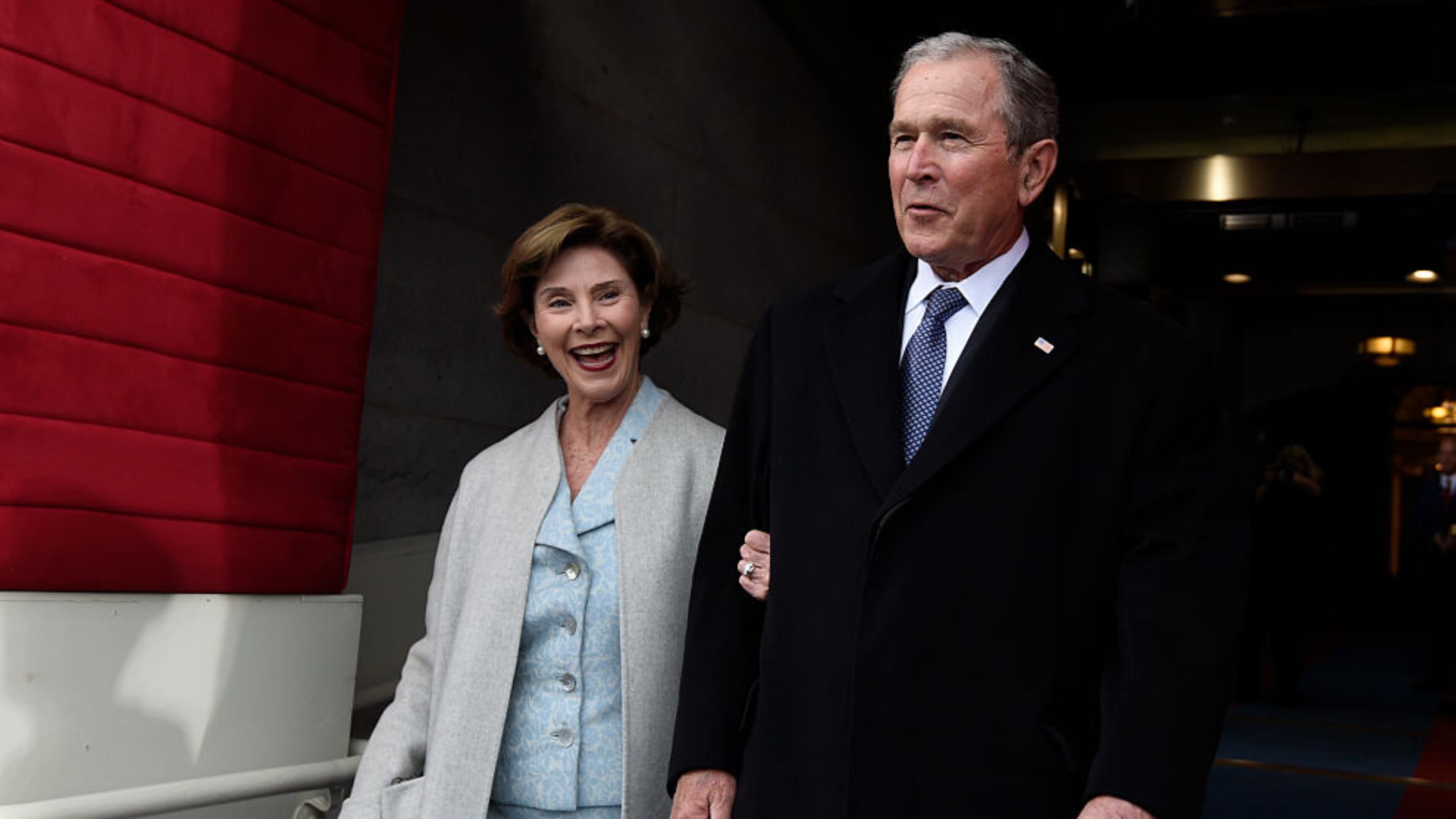 Former US President George W. Bush and First Lady Laura Bush arrive for the Presidential Inauguration of Donald Trump at the US Capitol on January 20, 2017 in Washington, DC. (Photo by Saul Loeb - Pool/Getty Images)