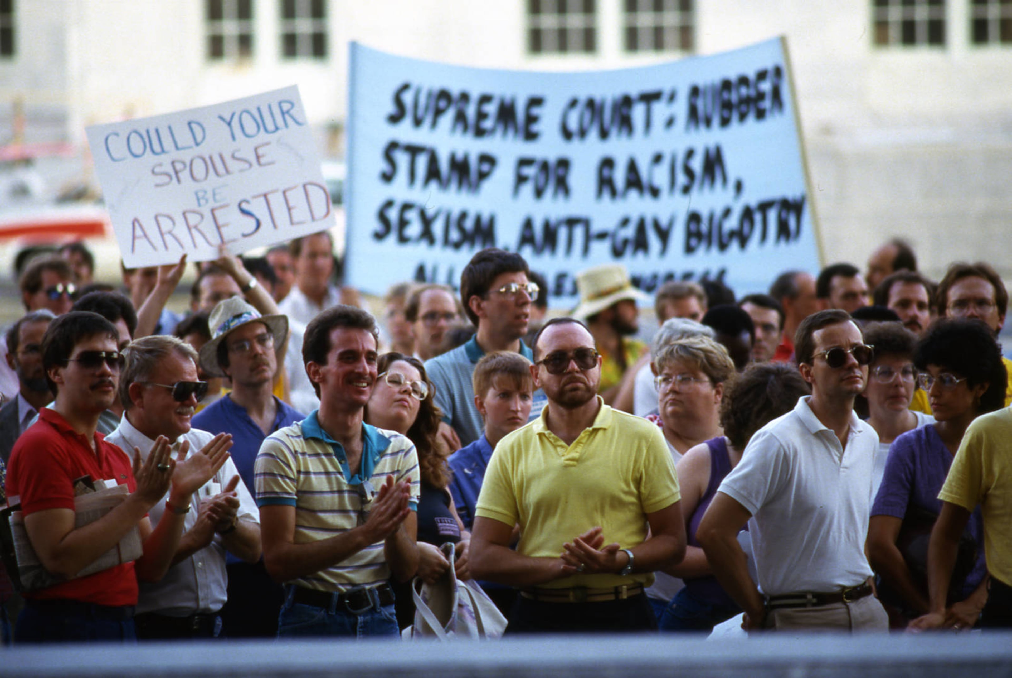 Gay rights demonstration, held in the wake of the U.S. Supreme Court decision on Bowers v. Hardwick, a Georgia sodomy case, Richard B. Russell Federal Building, Atlanta, Georgia, July 3, 1986.