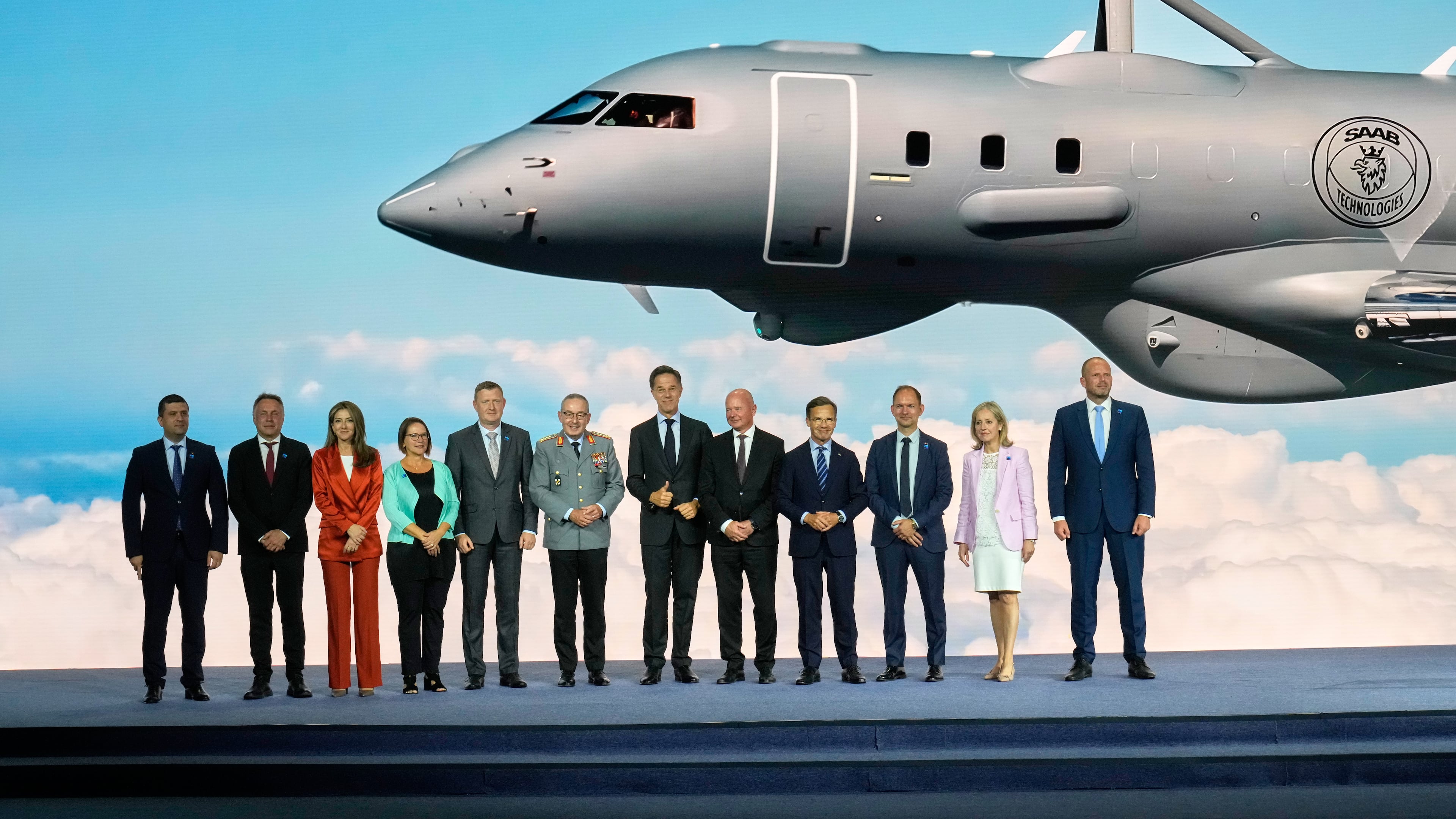 NATO Secretary General Mark Rutte, center, poses with NATO defense ministers and industry representatives during the opening of the NATO Defense Industry Forum on the sidelines of the NATO summit in Ankara, Turkey, Tuesday, July 7, 2026. (AP Photo/Hussein Malla)