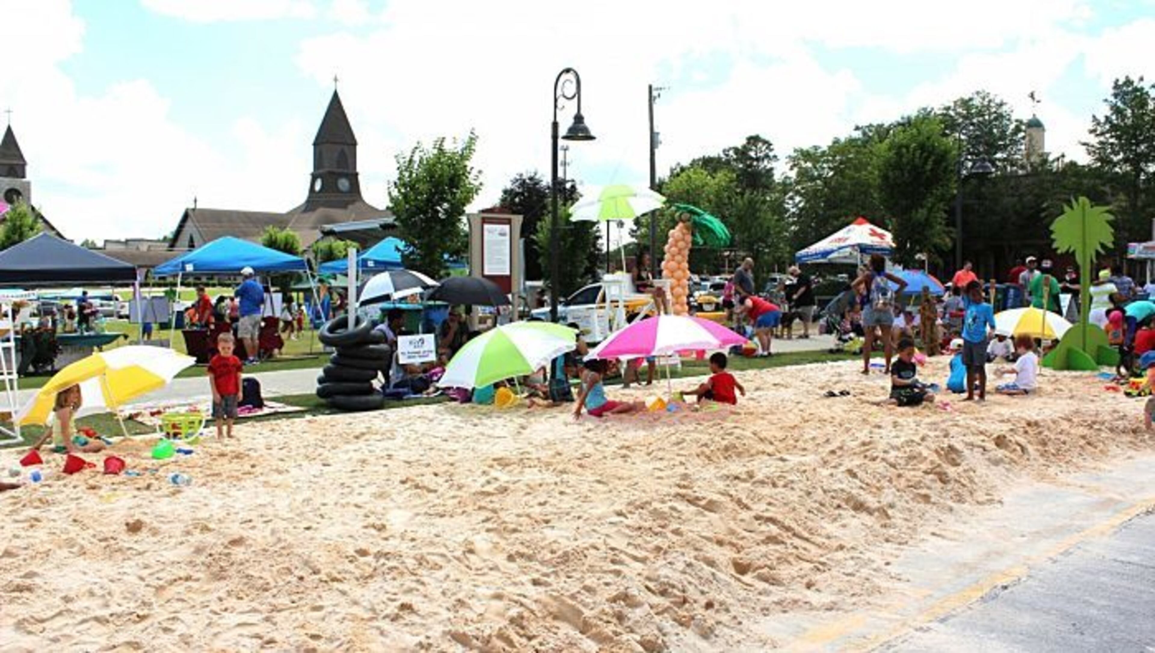 Oak Road in Snellville will be transformed with 70 tons of soft sand this Saturday at the Beach Bash.
