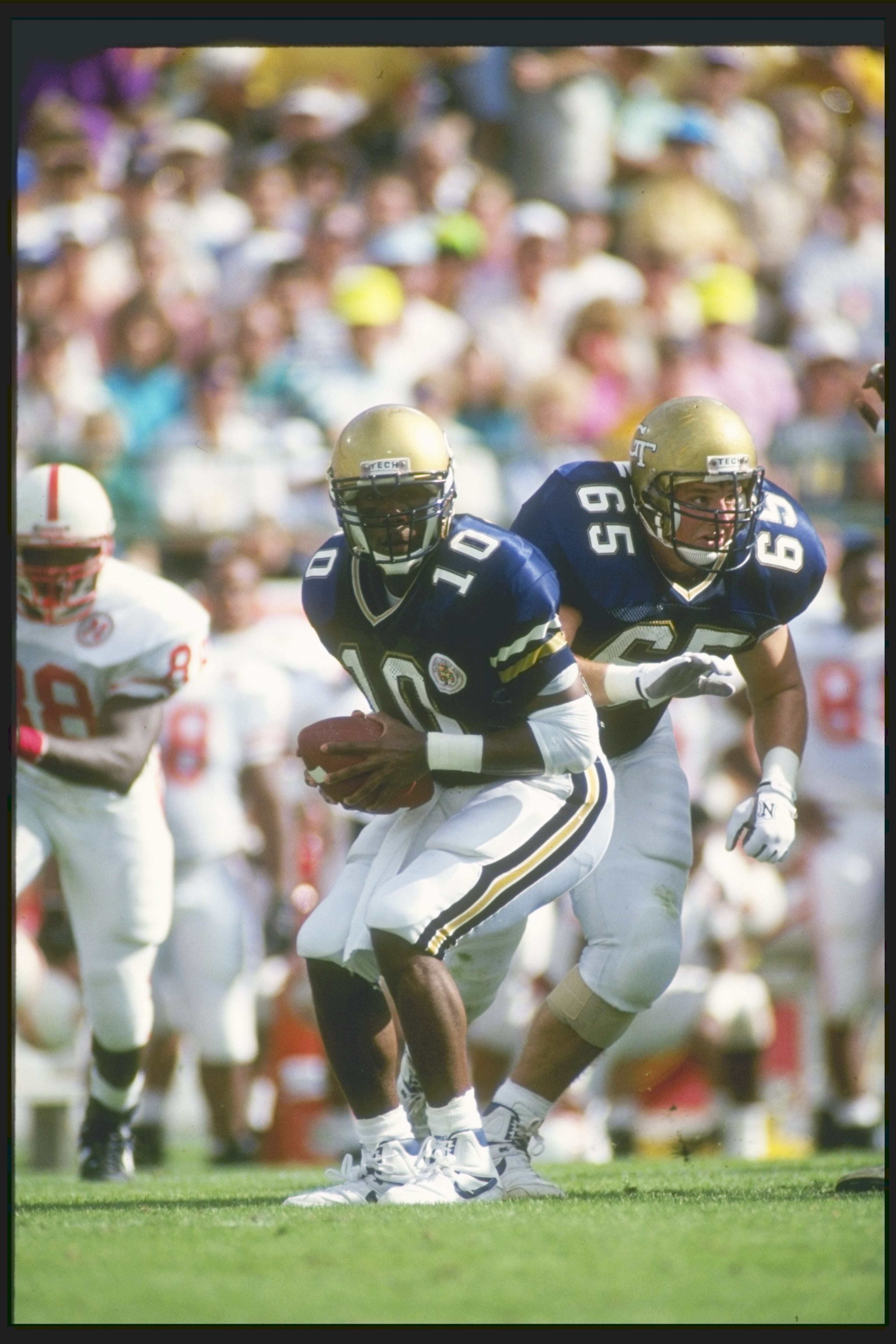 Georgia Tech quarterback Shawn Jones runs with the ball against Nebraska at the Citrus Bowl in Orlando, Fla., a game Tech won 45-21 on their way to the UPI national championship. Scott Halleran / Allsport