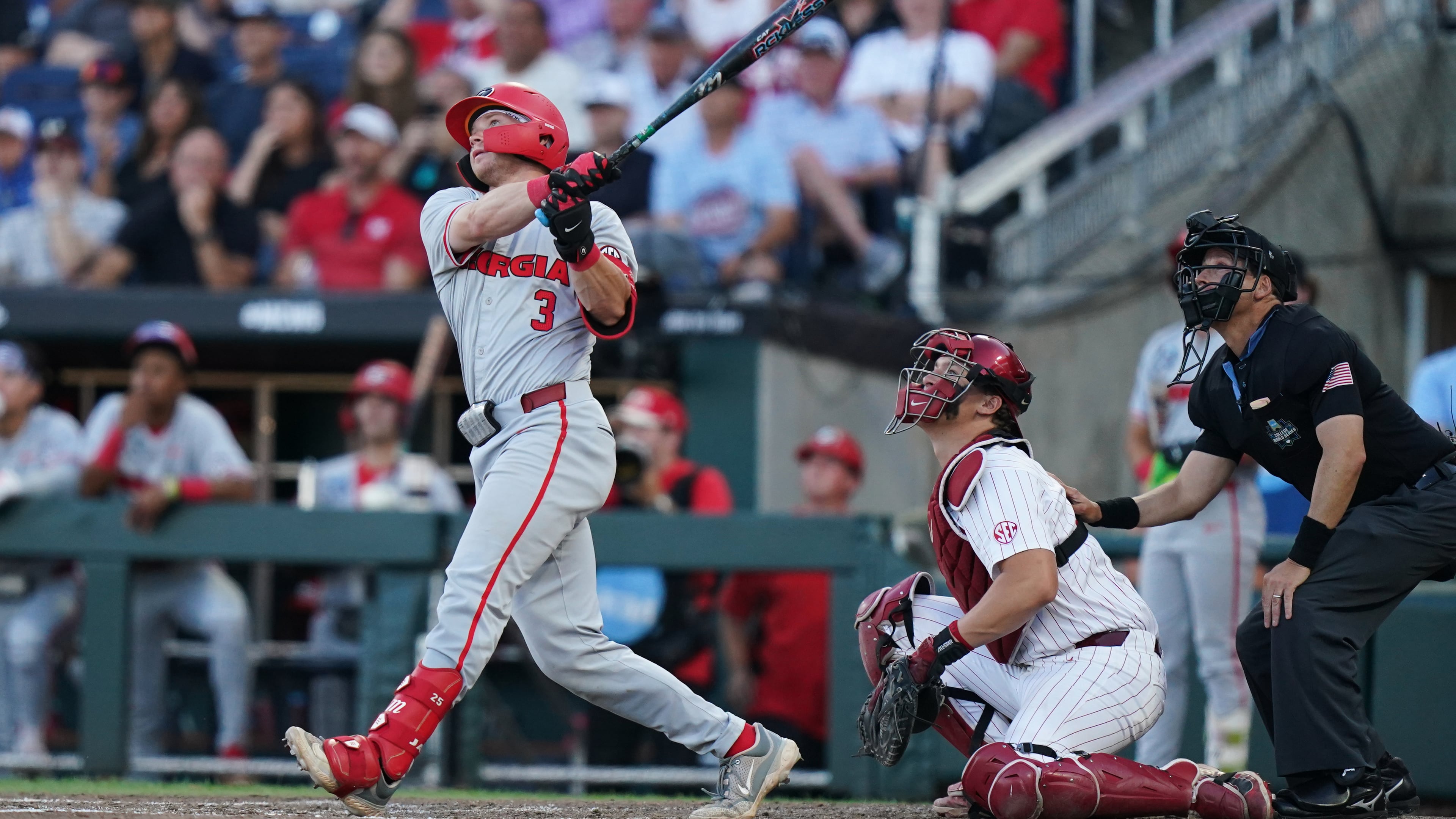 Georgia catcher Daniel Jackson (3) hits a homer during an NCAA baseball College World Series game against Oklahoma, Monday, June 15, 2026 in Omaha, Neb. Oklahoma won 4-3. (Vera Nieuwenhuis/AP)