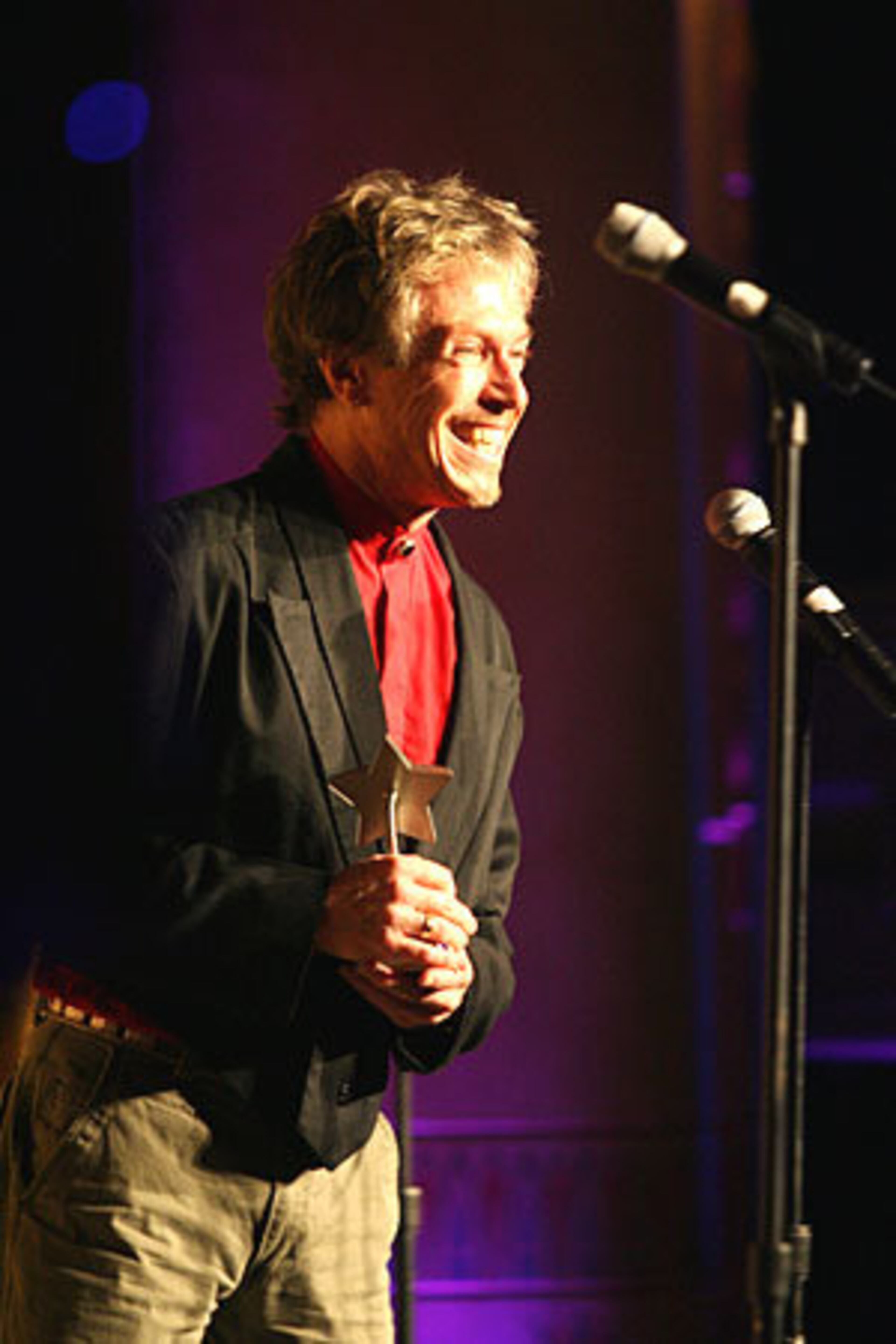 Michael Fauss thanks the crowd as he is honored for his musical direction.