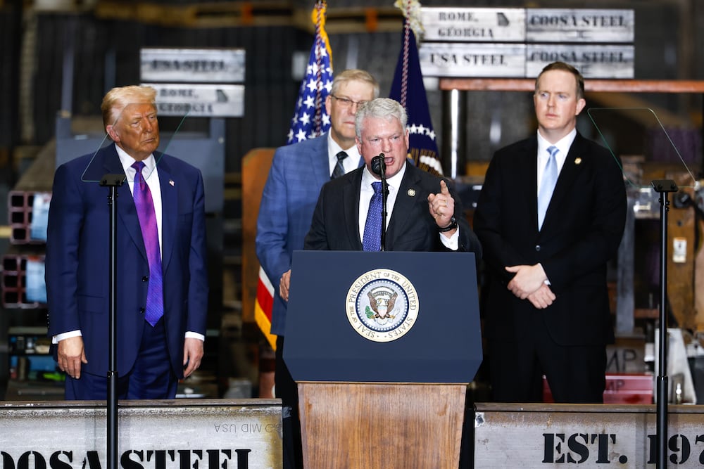 U.S. Rep. Mike Collins, R-Jackson, speaks during President Donald Trump's rally at Rome's Coosa Steel service center in February. (Arvin Temkar/AJC)