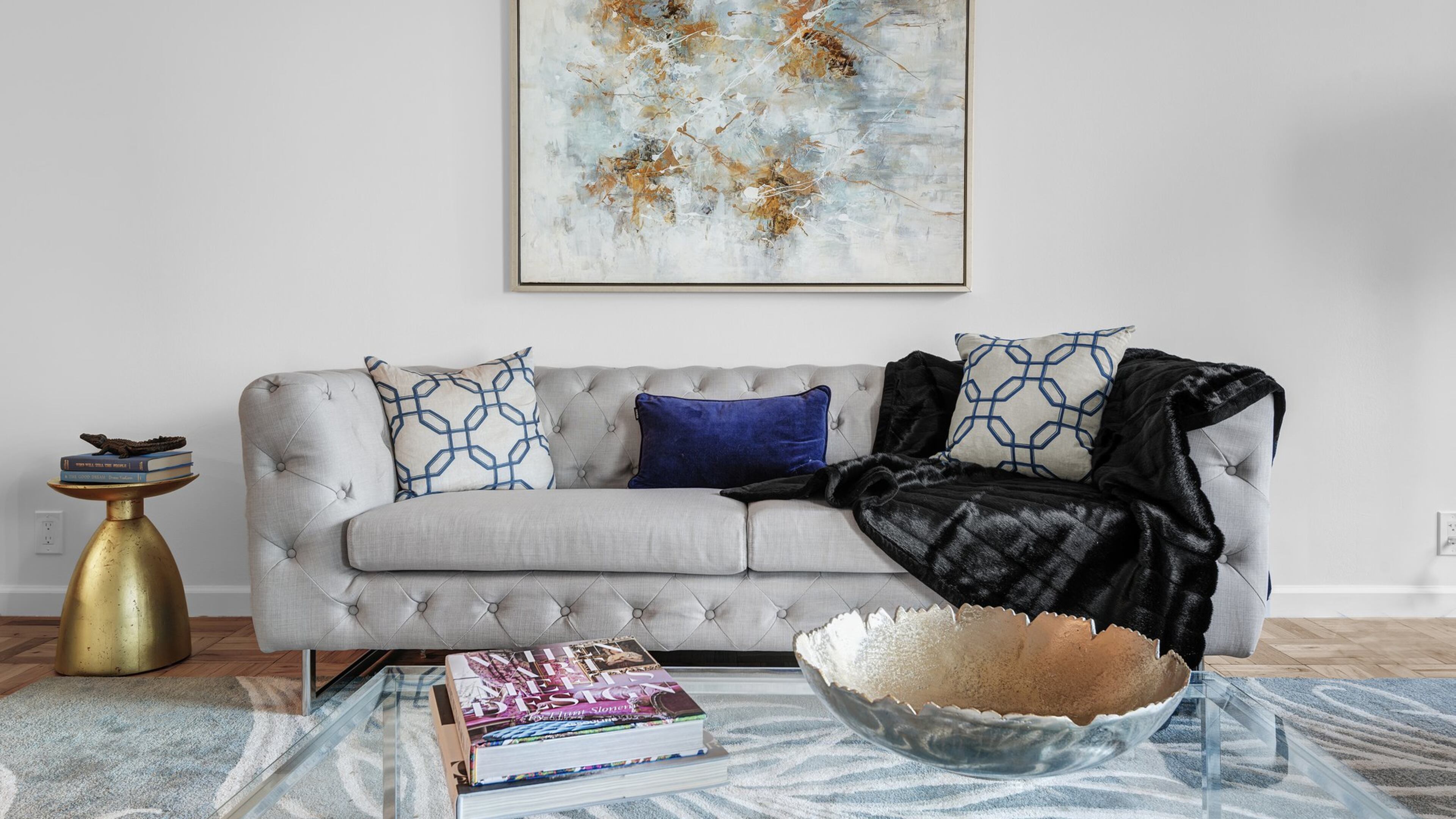 Don t be afraid to mix different fabrics or materials. Here, silk pillows are paired with a velvet accent pillow and faux fur throw. (Design Recipes/TNS)