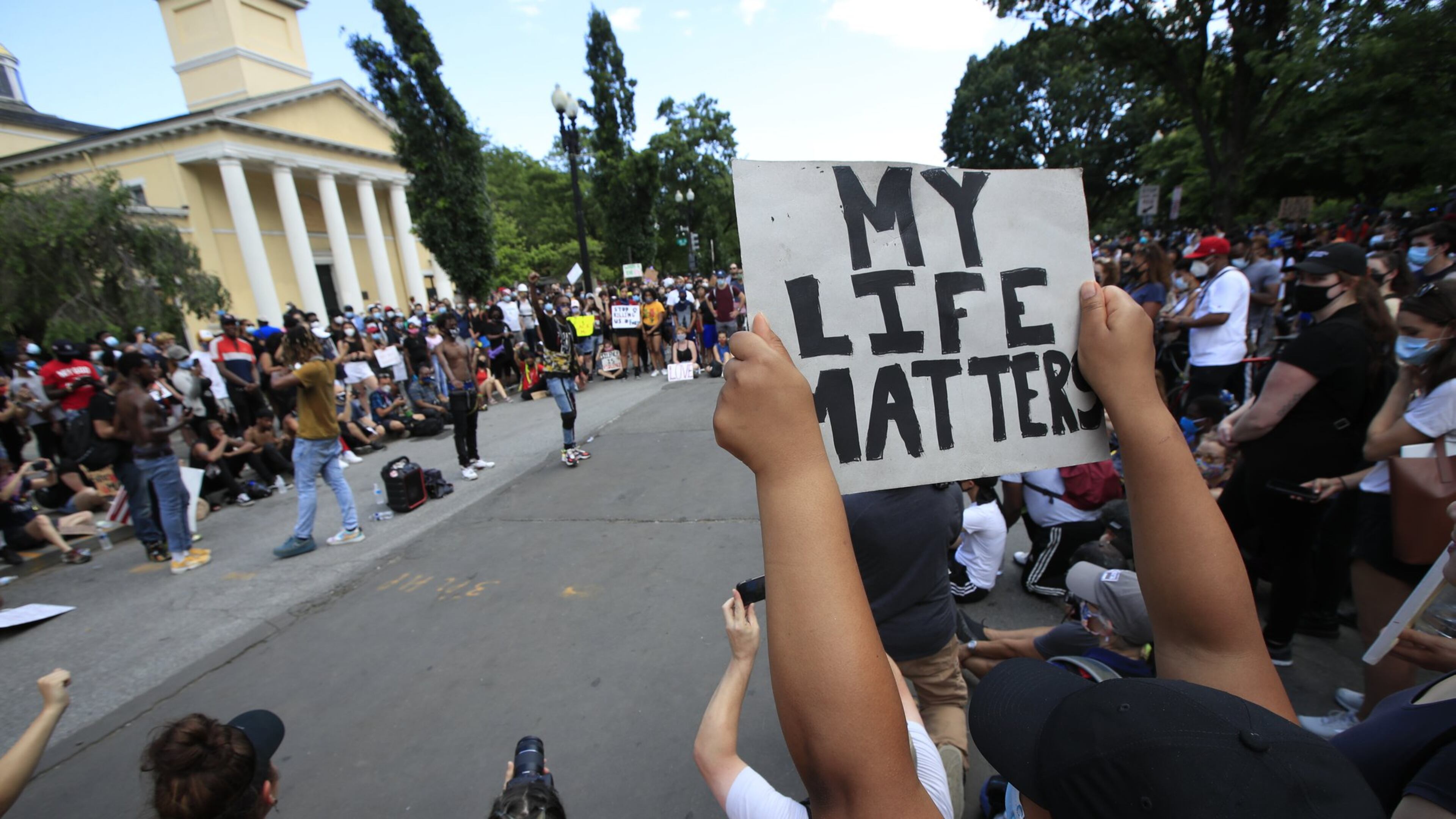 Demonstrators protest Friday, June 5, 2020, near the White House in Washington, over the death of George Floyd, a black man who was in police custody in Minneapolis. Floyd died after being restrained by Minneapolis police officers. (AP Photo/Manuel Balce Ceneta)