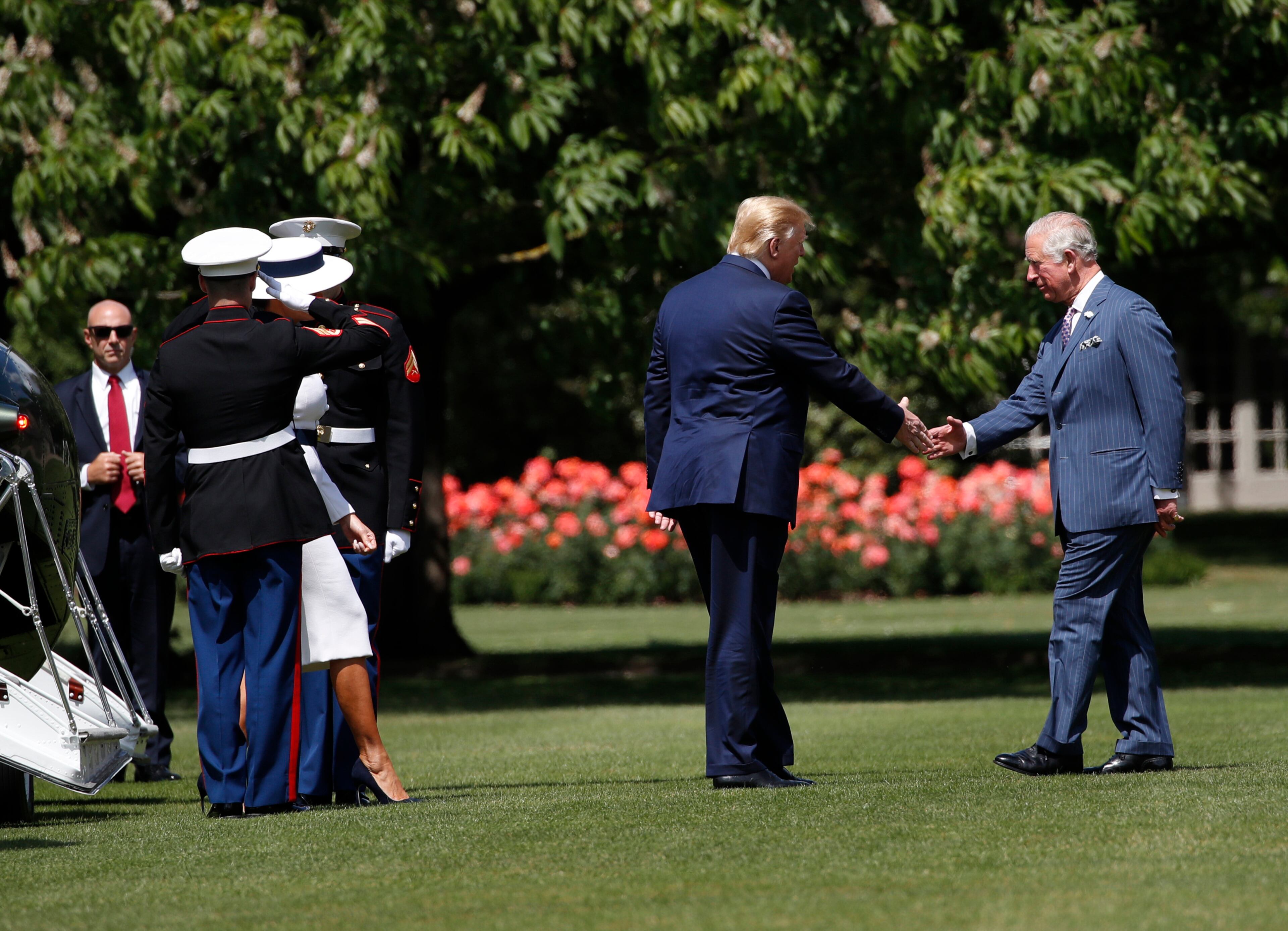 President Donald Trump is greeted by Prince Charles at Buckingham Palace after departing Marine One on arrival, Monday, June 3, 2019, in London. (AP Photo/Alex Brandon)